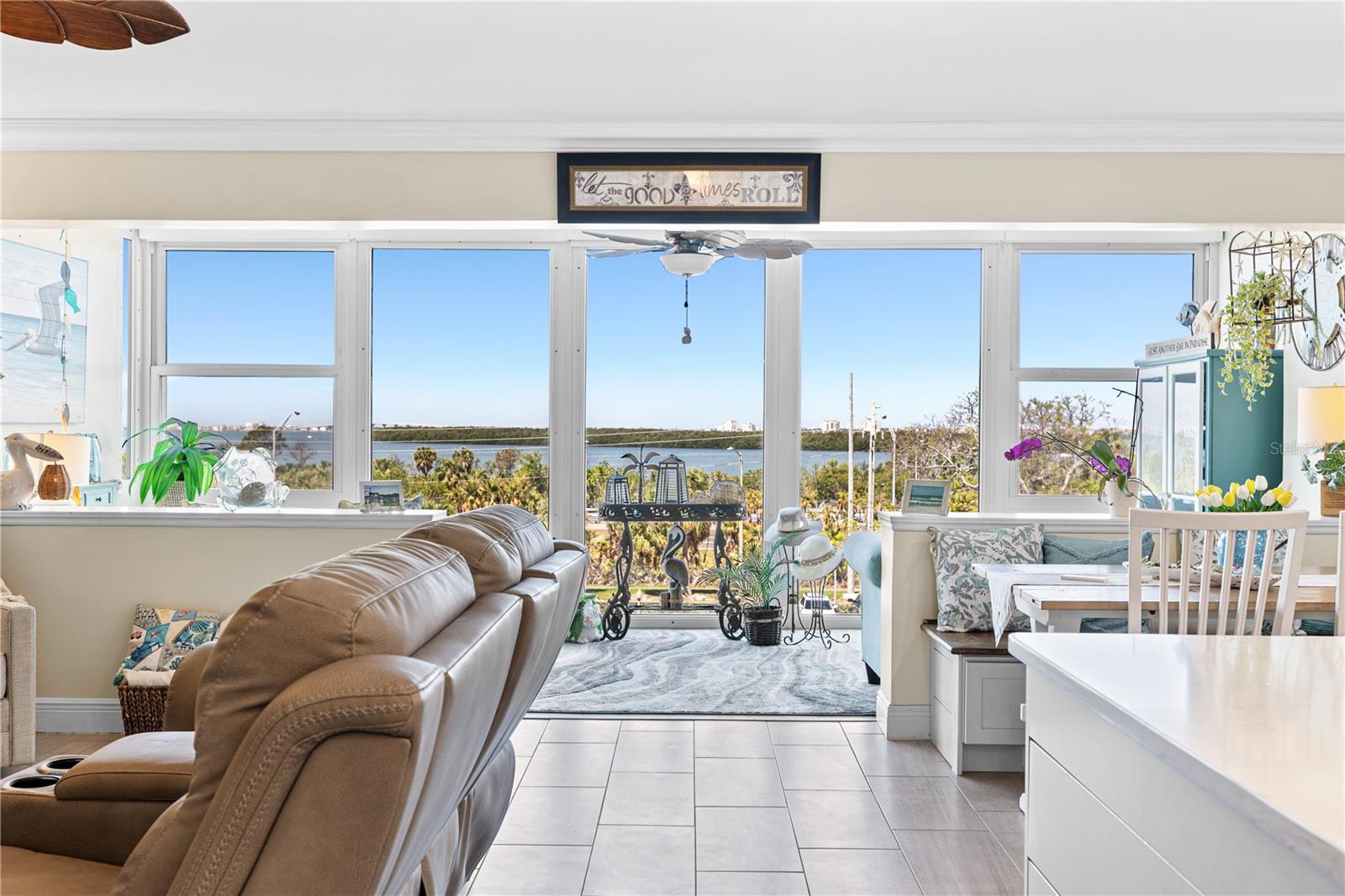 While the floor to ceiling windows offers amazing views and lots of natural light, they are also equipped with custom fitted electric shades, for privacy at the touch of a button.