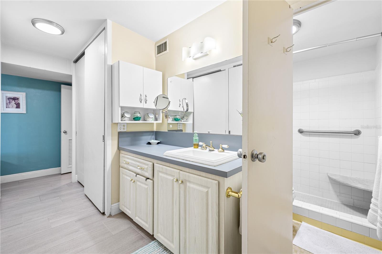 Large vanity area offers a place to freshen up, get ready or wind down for the night.