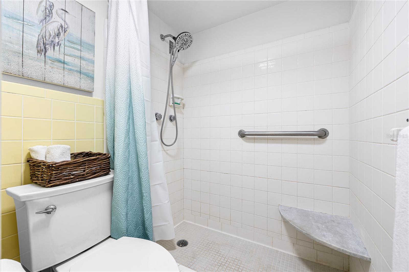 Separate water closet and walk in shower, for privacy.