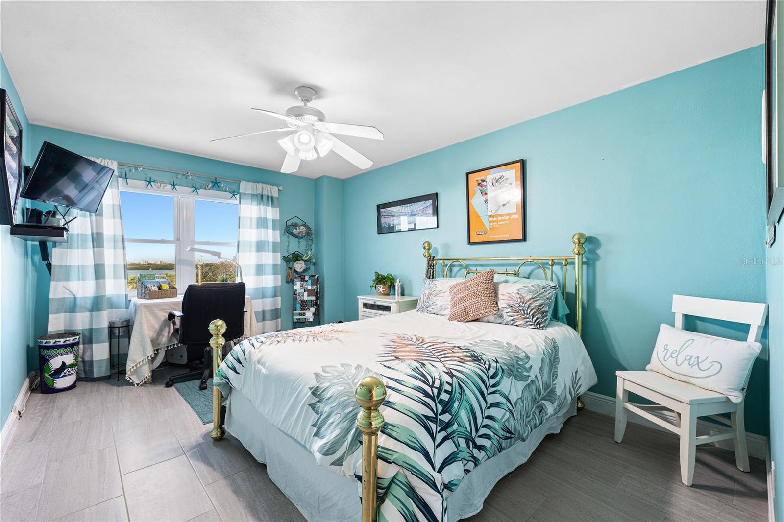 The second bedroom is also a nicely sized room. Window has electric shades, for privacy at the touch of a button.