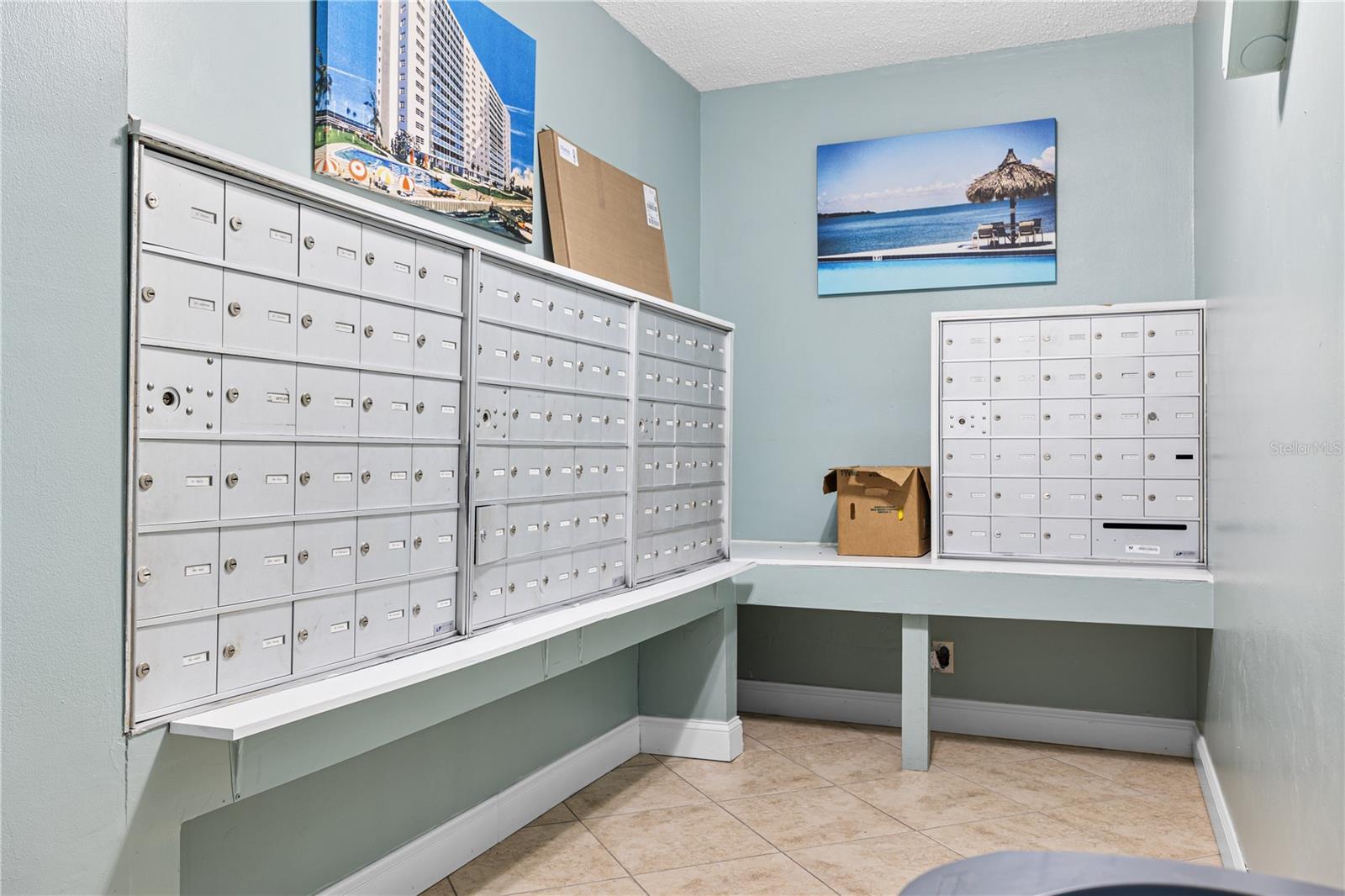 The mail room is kept tidy and provides easy access for mail and package delivery and pickup.