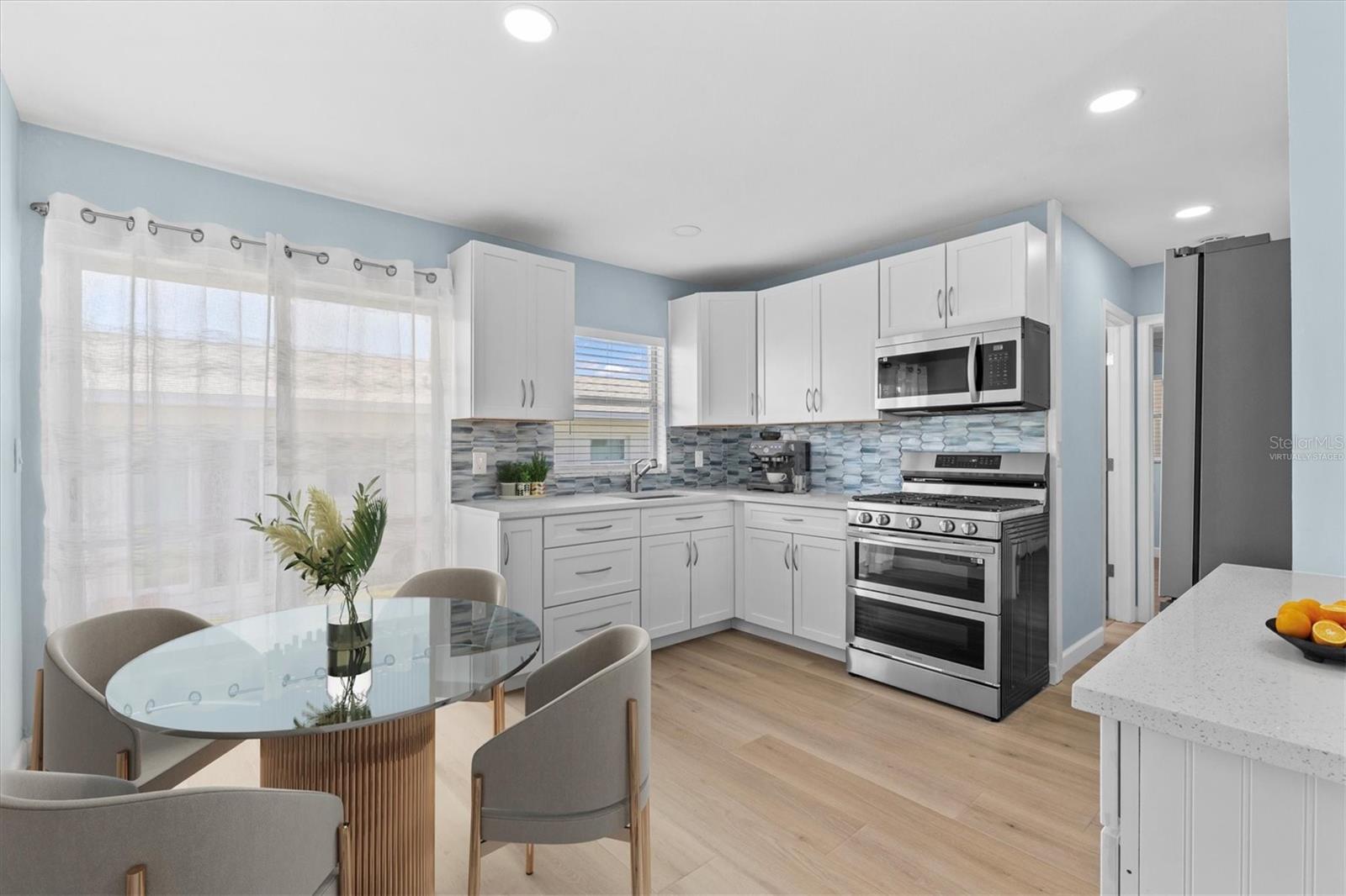 Virtually Staged showing Kitchen & Dining Space