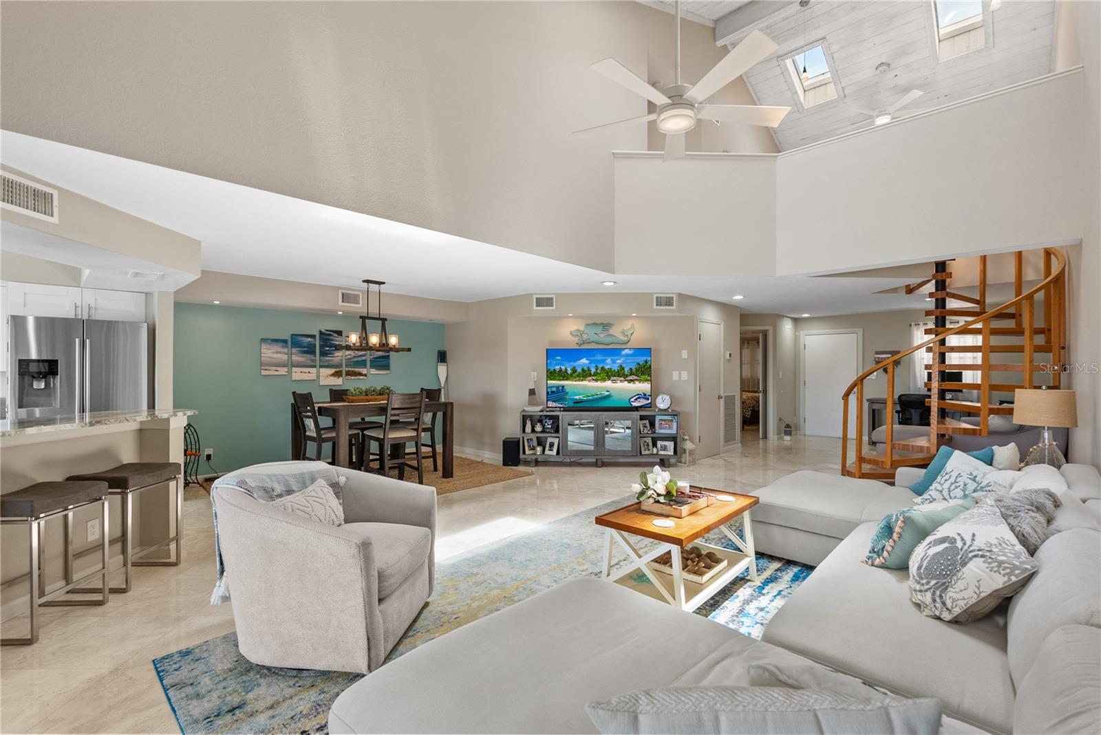 High vaulted ceilings give a bright and airy feel to the whole space