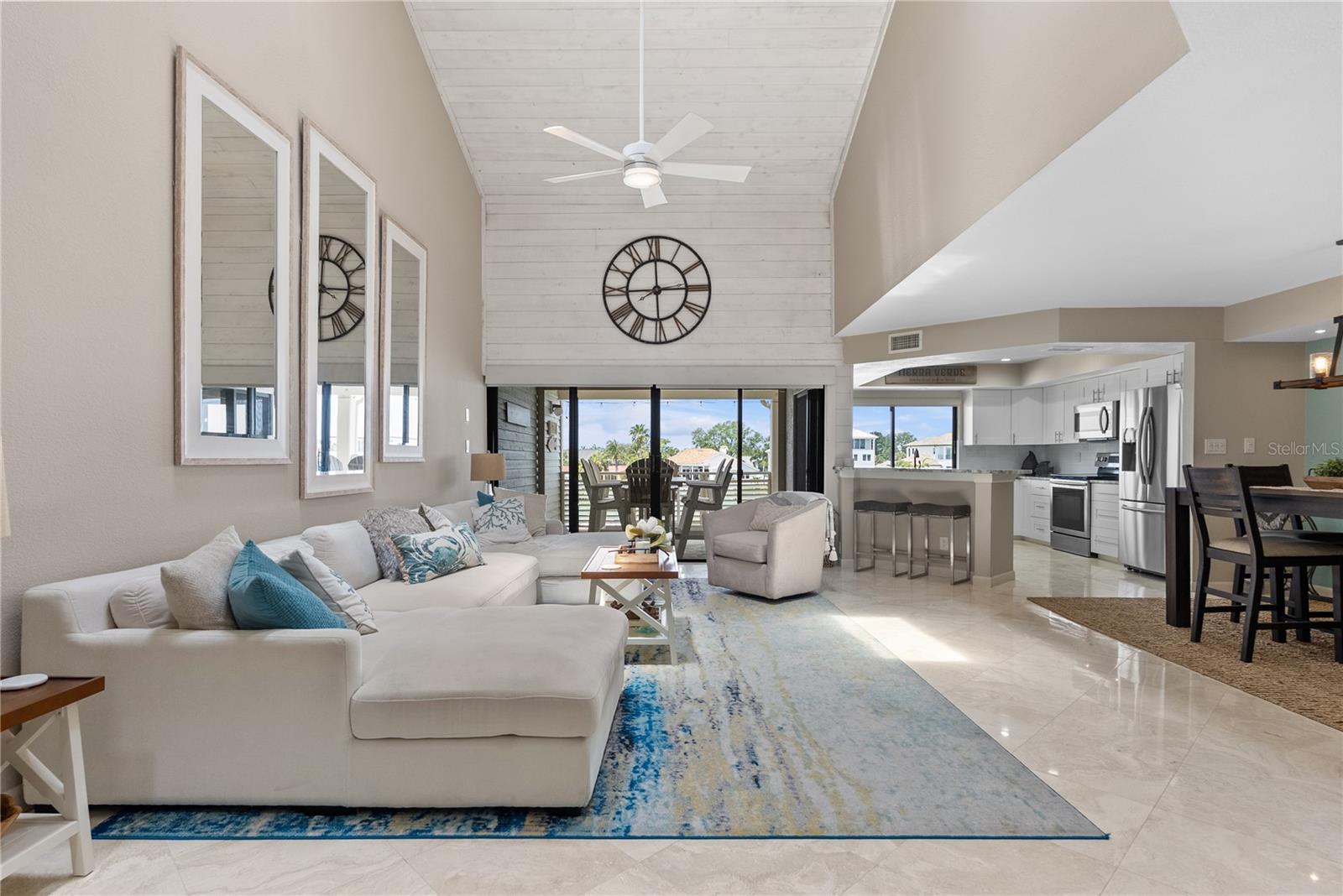 Large living area with high vaulted ceilings