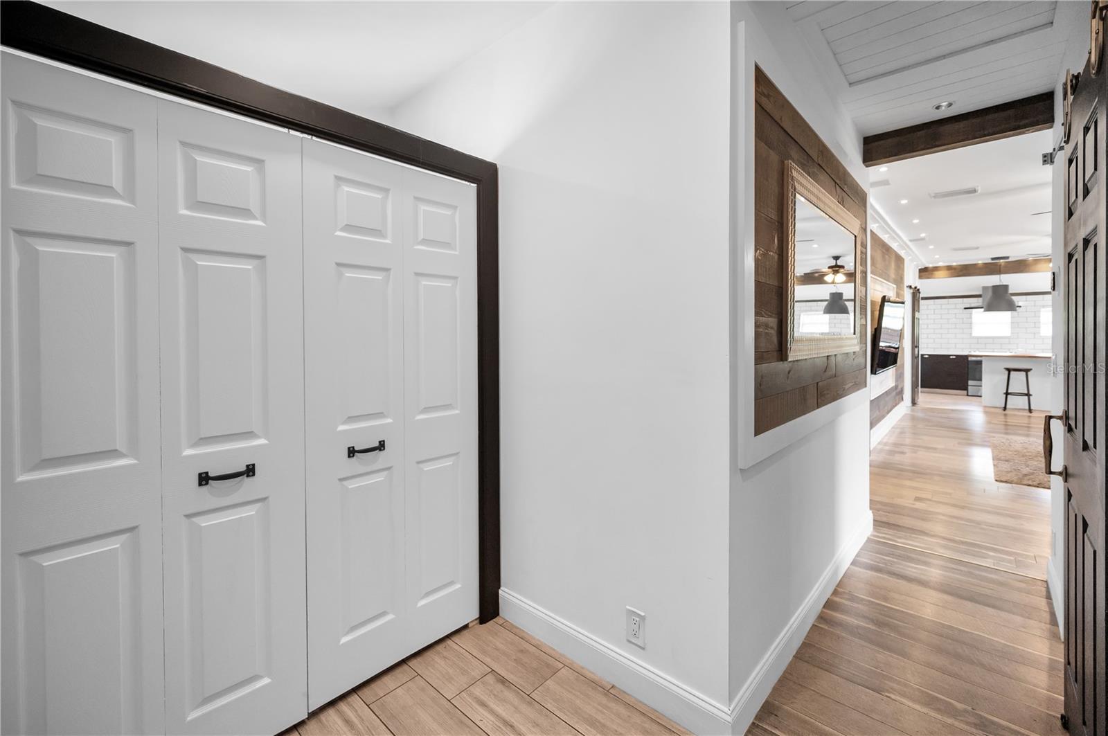 Foyer and indoor laundry closet