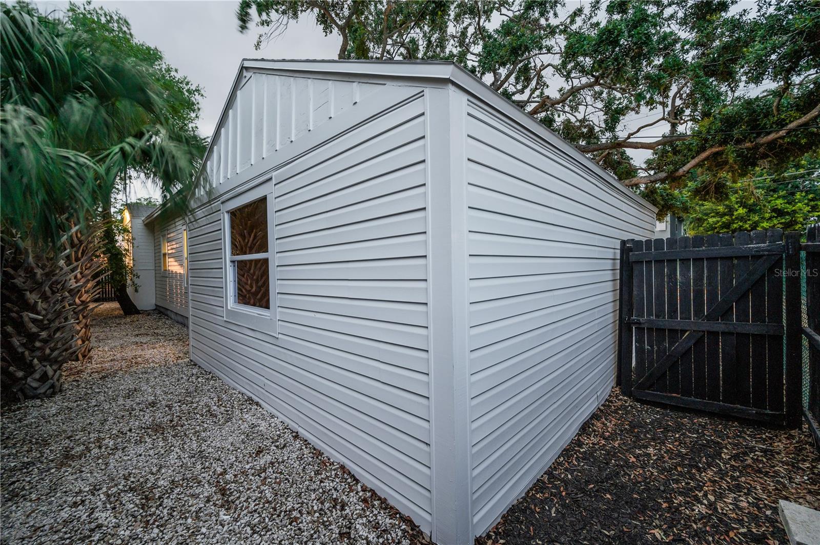 Private fenced in backyard