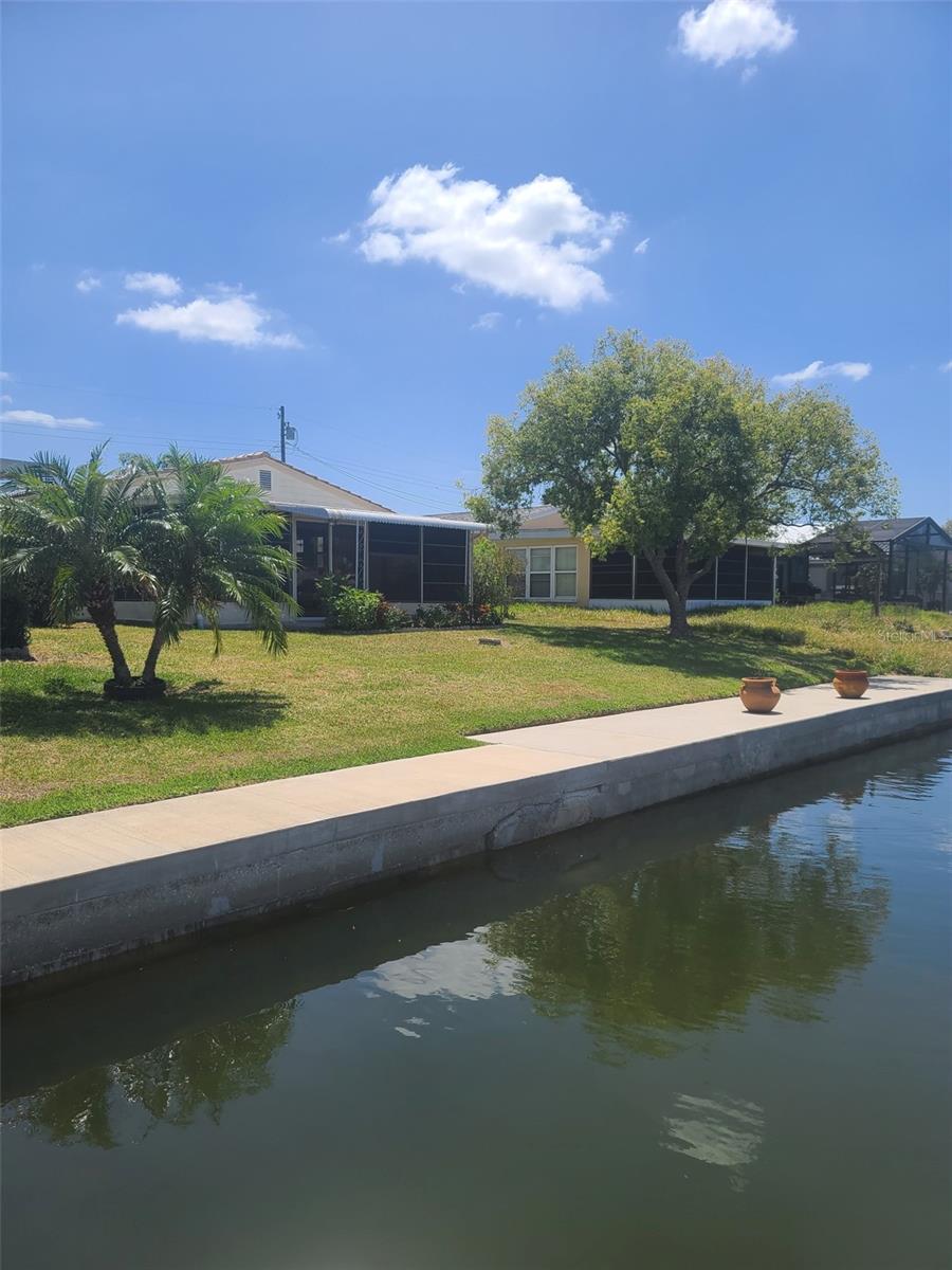 SEAWALL Back yard ready for Sparkling Pool and Boat!