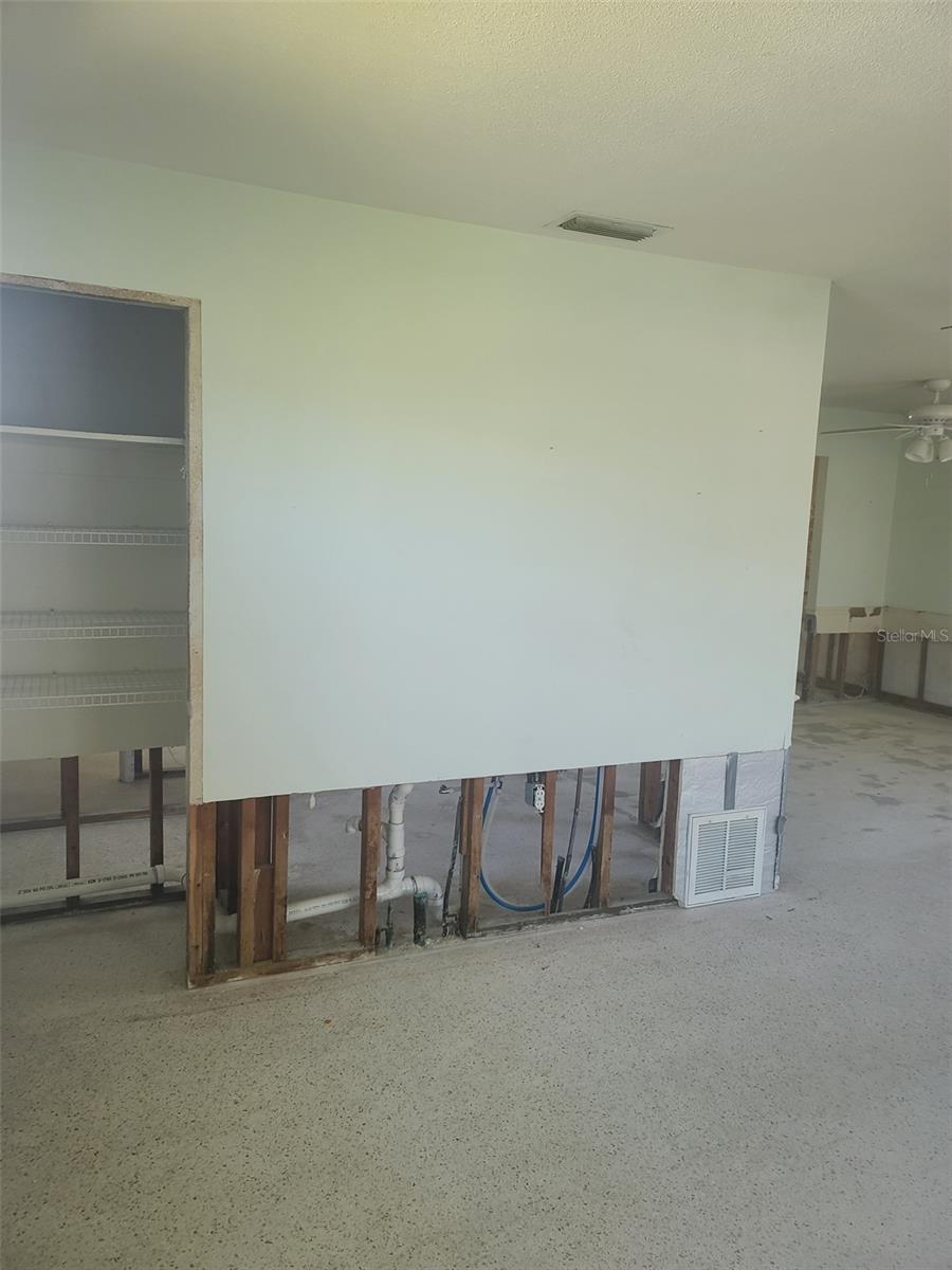 Laundry Room attached to LR/GR area
