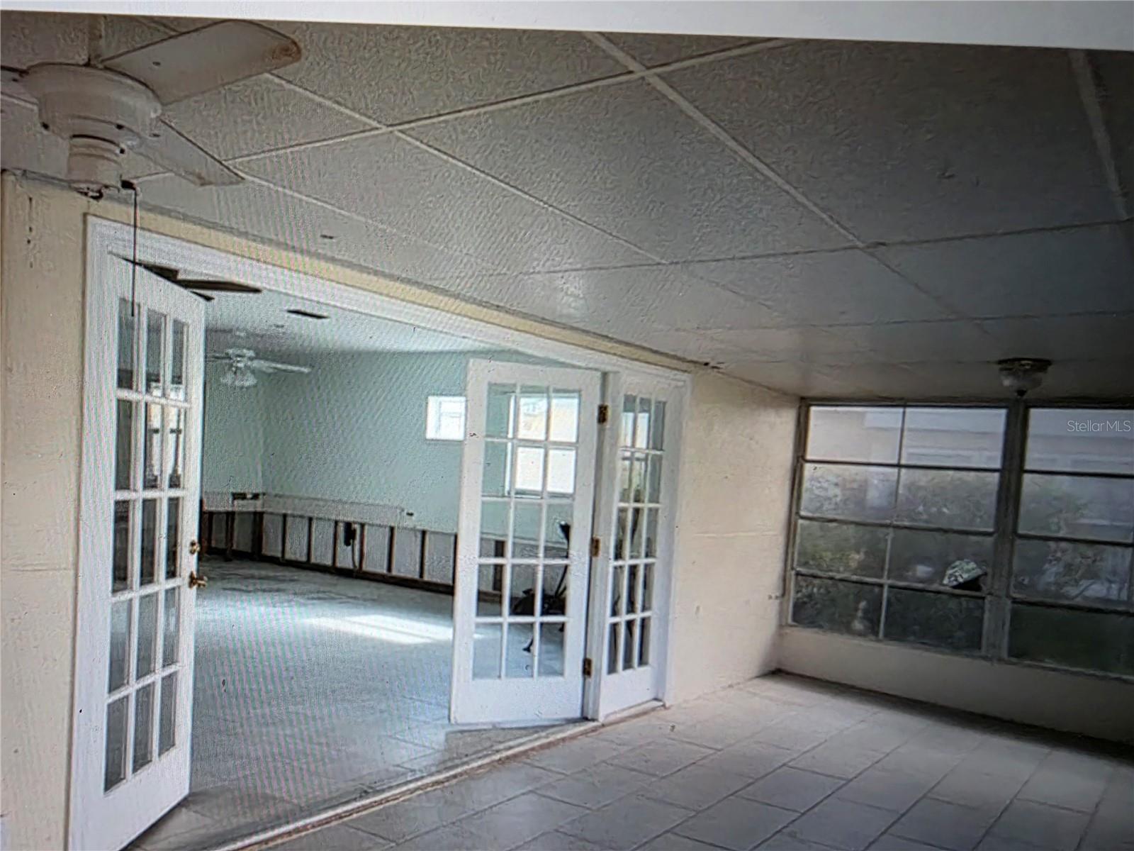 Virtual rehab of lanai with larger French Doors or