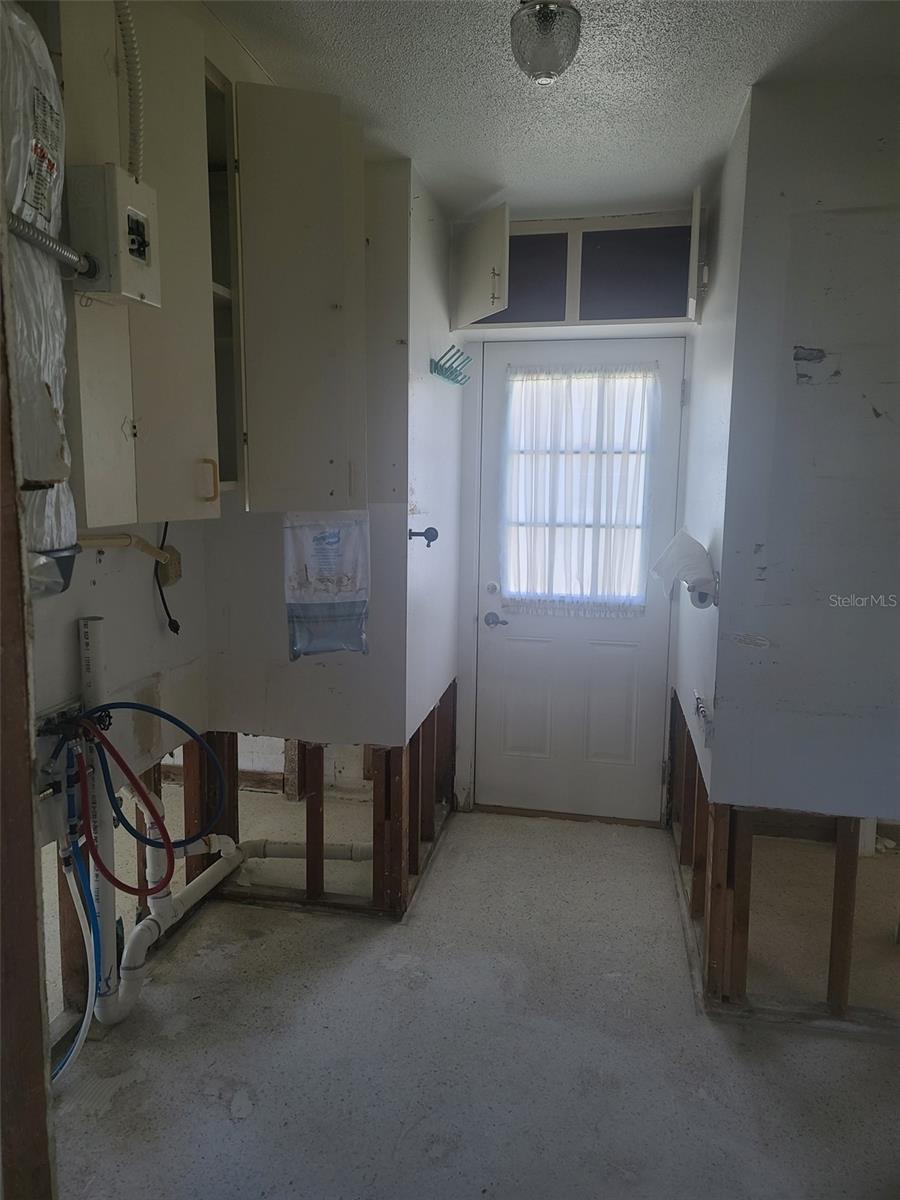Laundry Room with outdoor access Possible 2nd Bath electric Plumbing Exist
