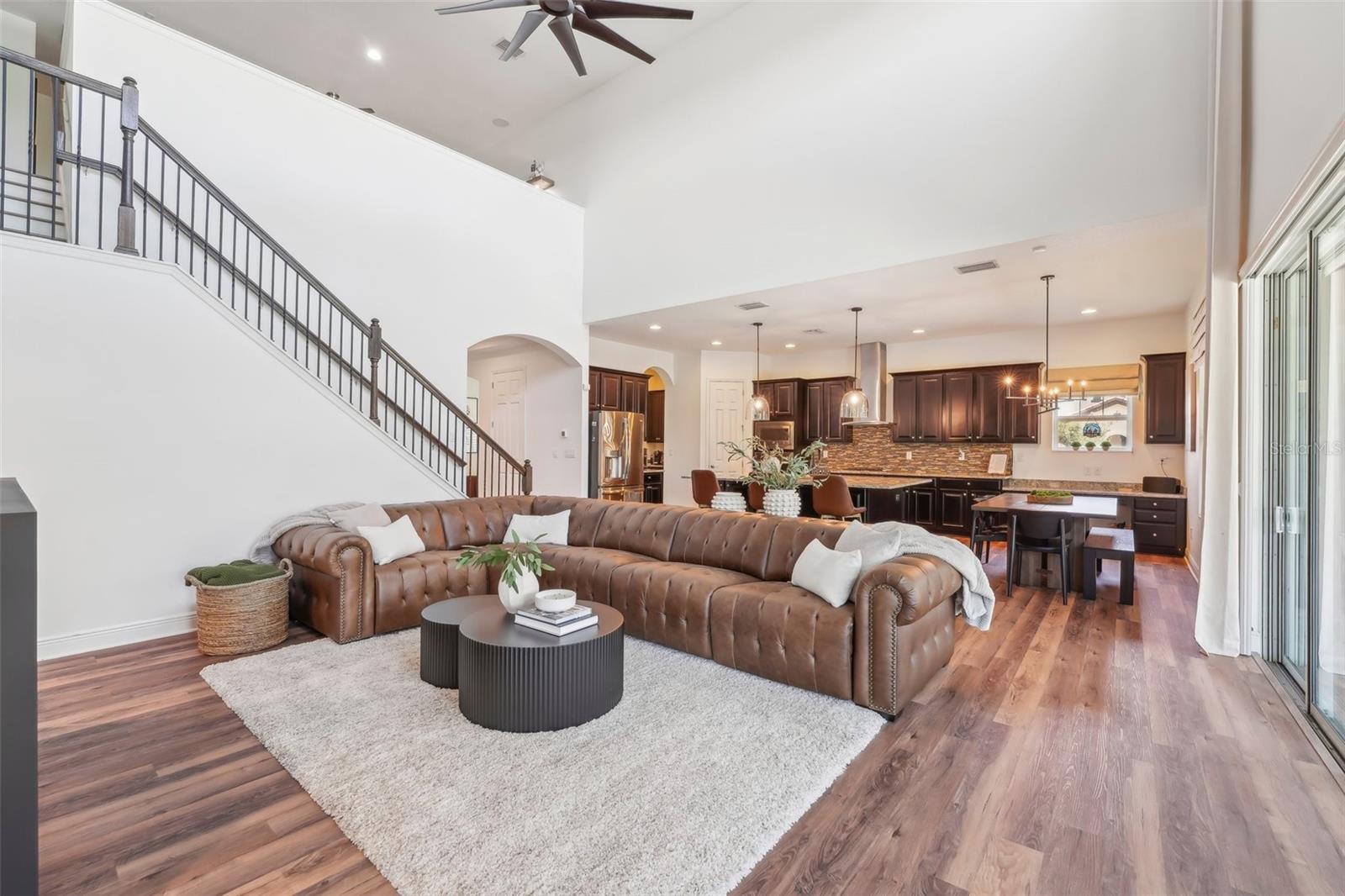 FAMILY ROOM HAS A WARM YET GRAND FEELING