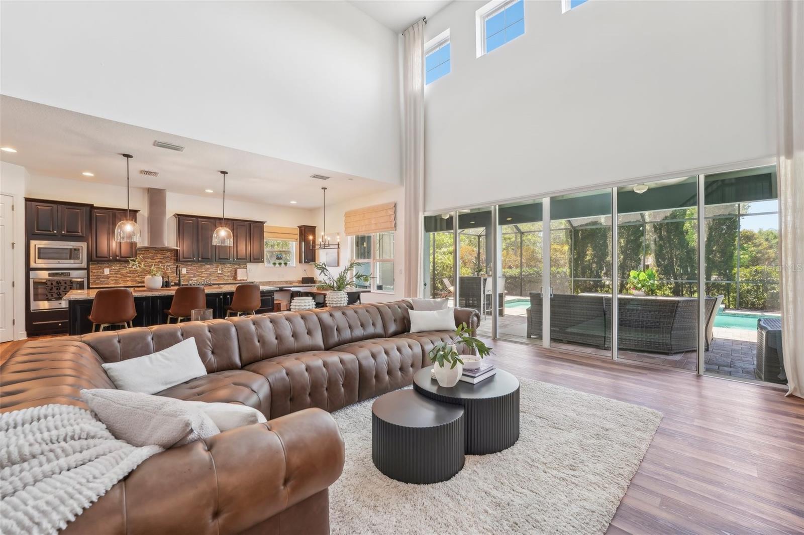 FAMILY ROOM HAS A WARM YET GRAND FEELING