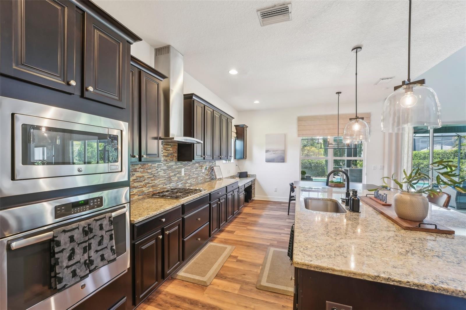 SPACIOUS KITHCEN WITH BUILT IN MICROWAVE, WALL OVEN AND STORAGE GALORE