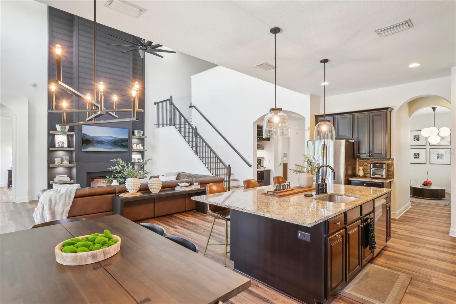 THIS EXPANSIVE KITCHEN IS THE REAL DEFINITION OF LUXURY! AND KEEPS YOU THE CENTER OF ATTENTION WHILE YOU ENTERTAIN! PEEP THE WINE BAR/FRIDGE TO THE RIGHT OF THE STAIR CASE!