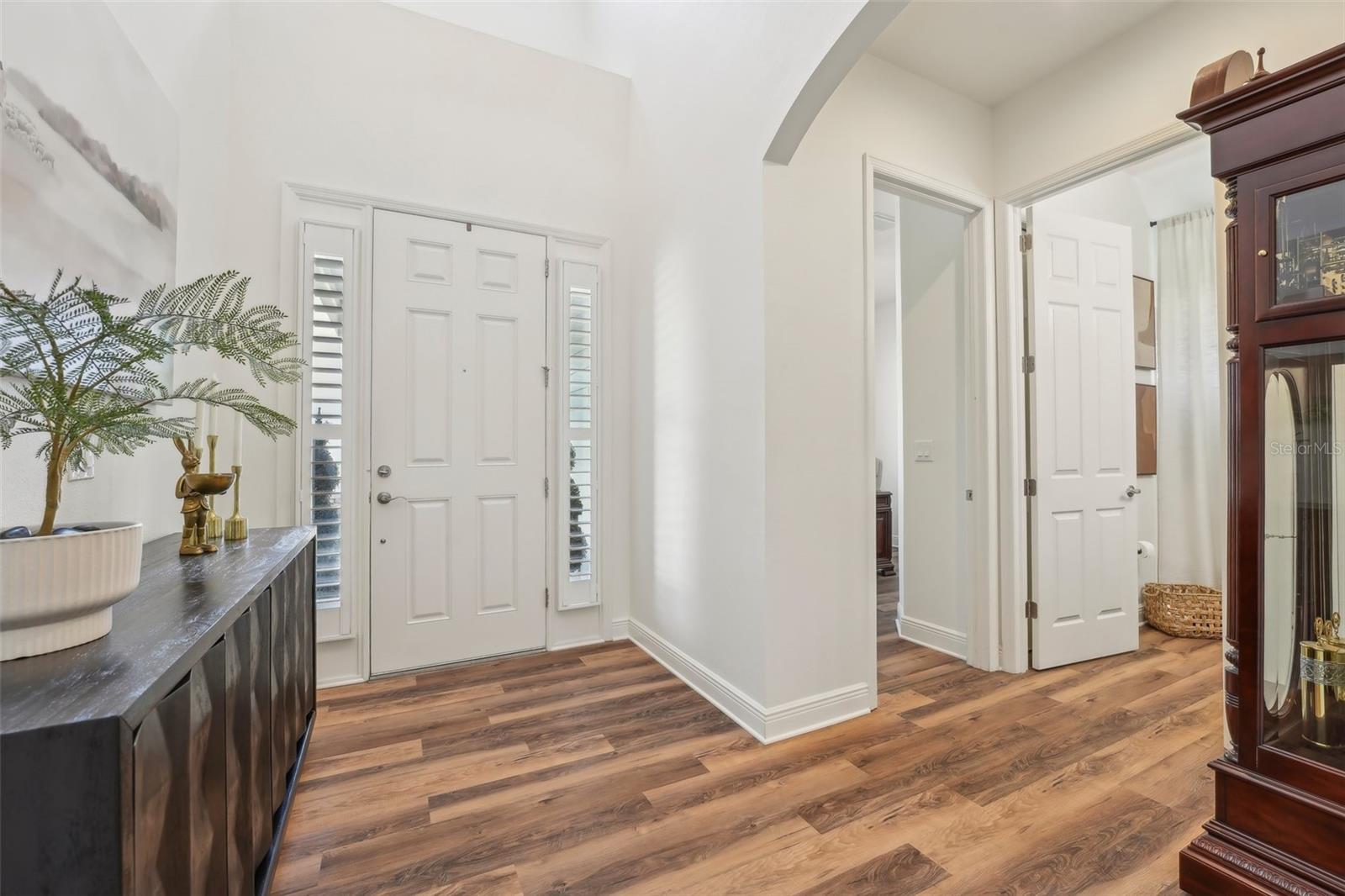 FOYER HALLWAY LEADS TO DOWN STAIRS BEDROOM 5 AND FULL GUEST BATH