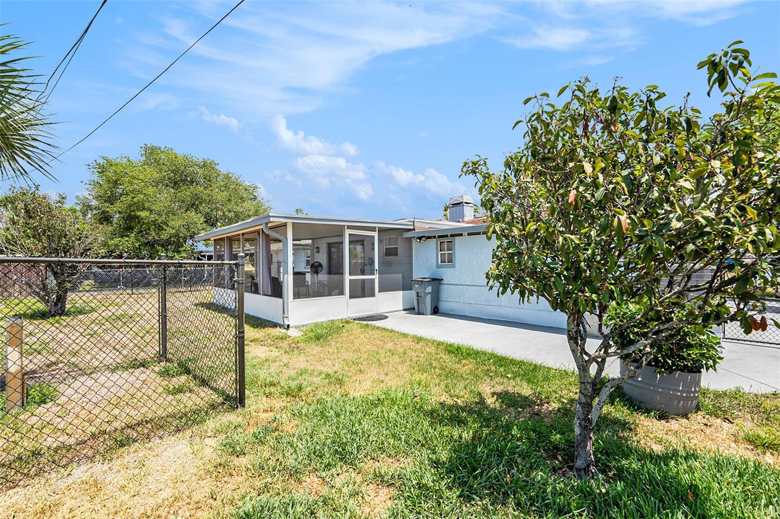 The fenced backyard provides privacy and space for your furry friends and family!