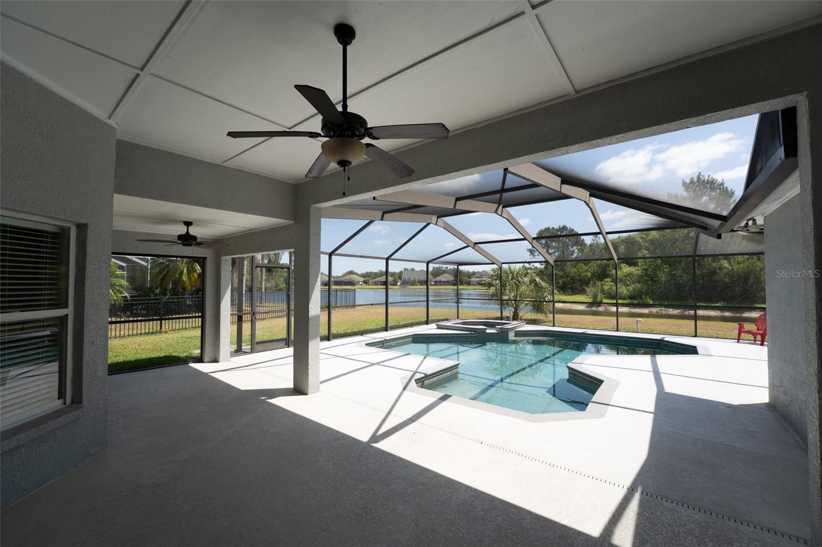 large lanai area for adding outdoor dining & living areas