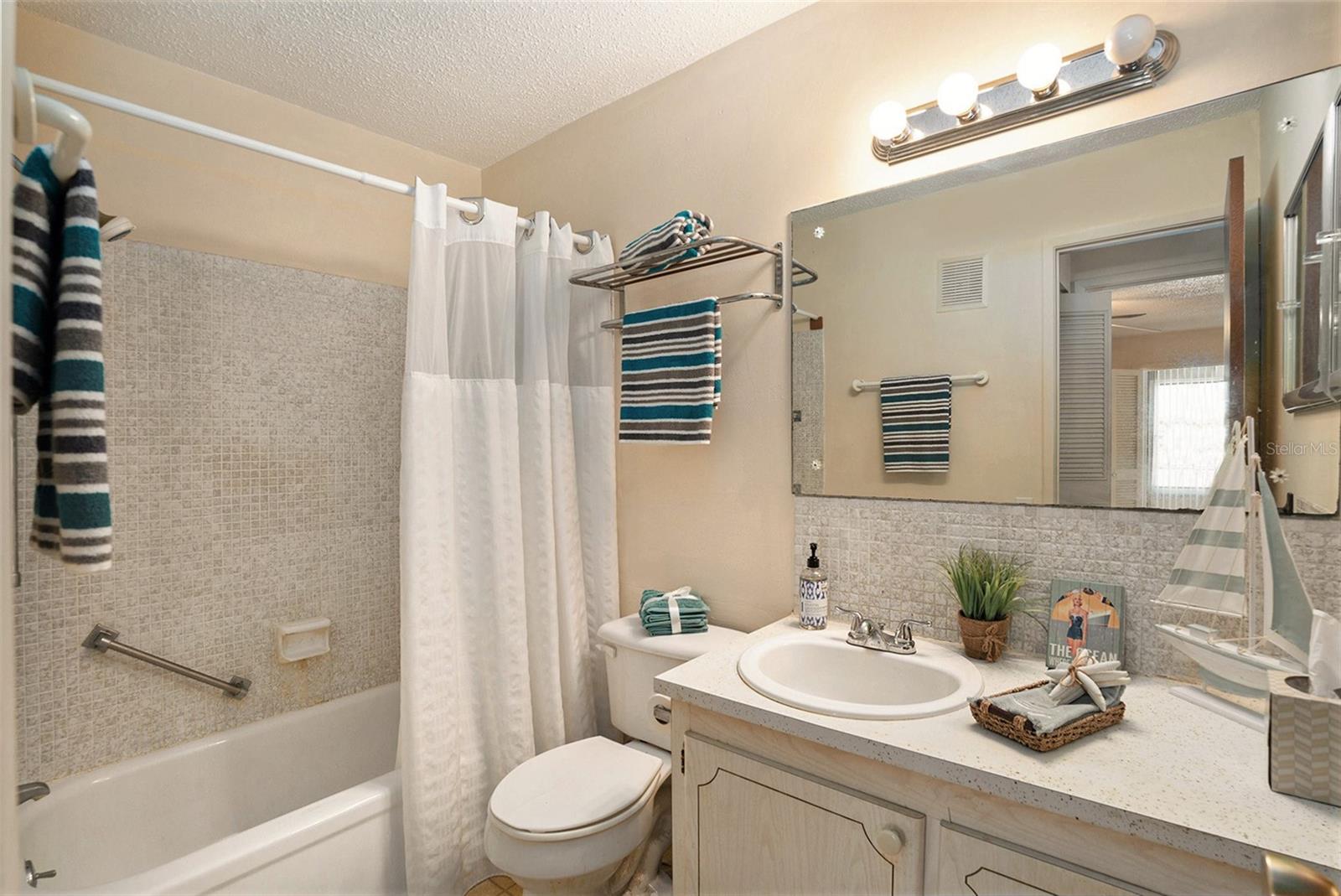 Your full bath has a large tub & shower....