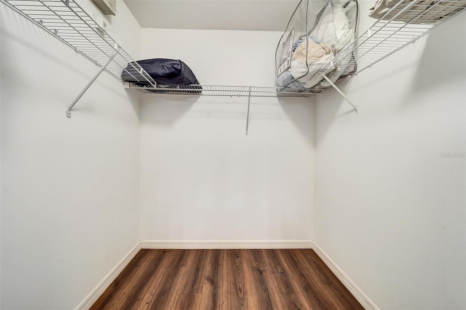 Primary Owner walk-in closet