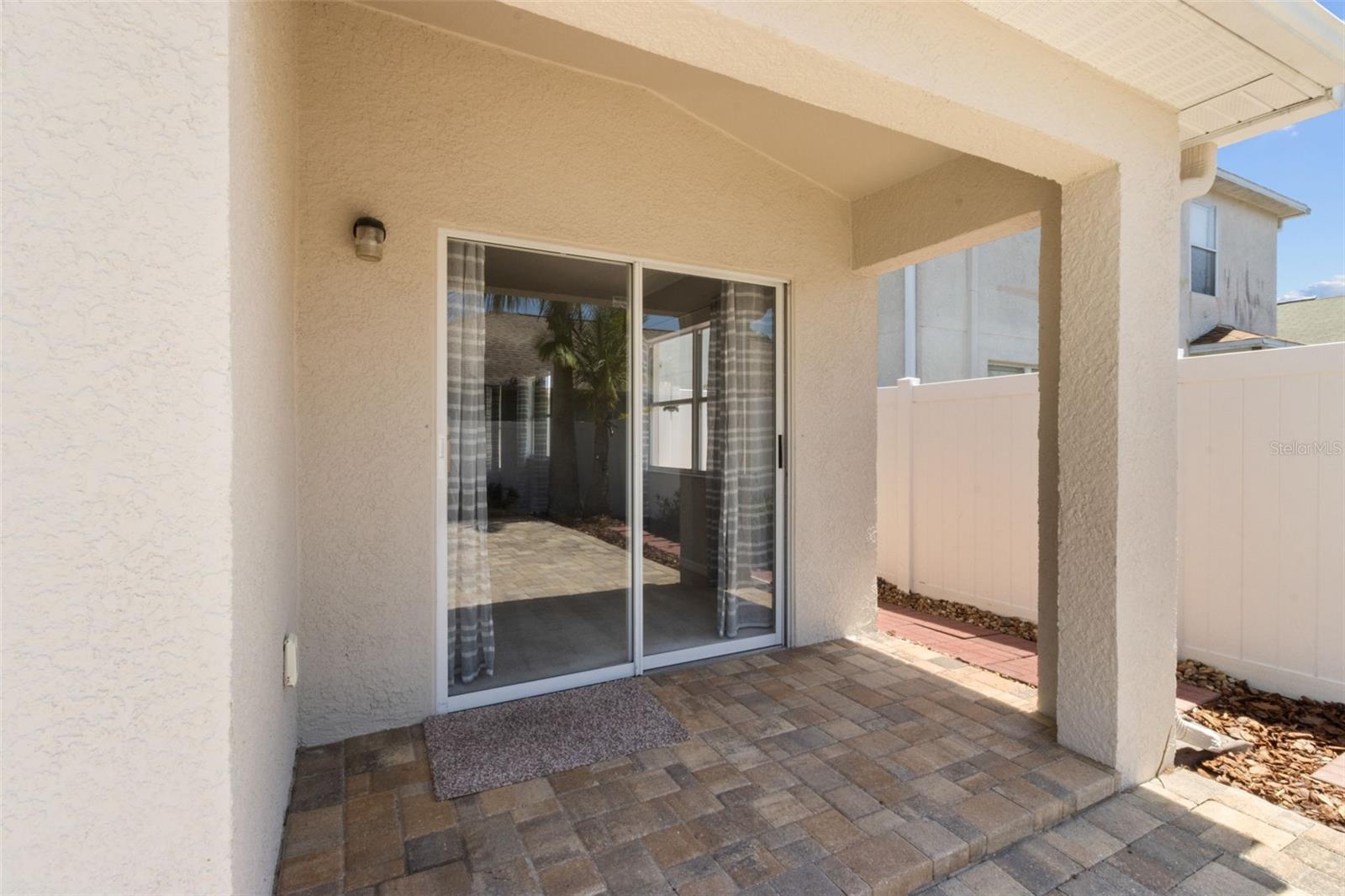 Covered part of the lanai to store your grill for barbequing!