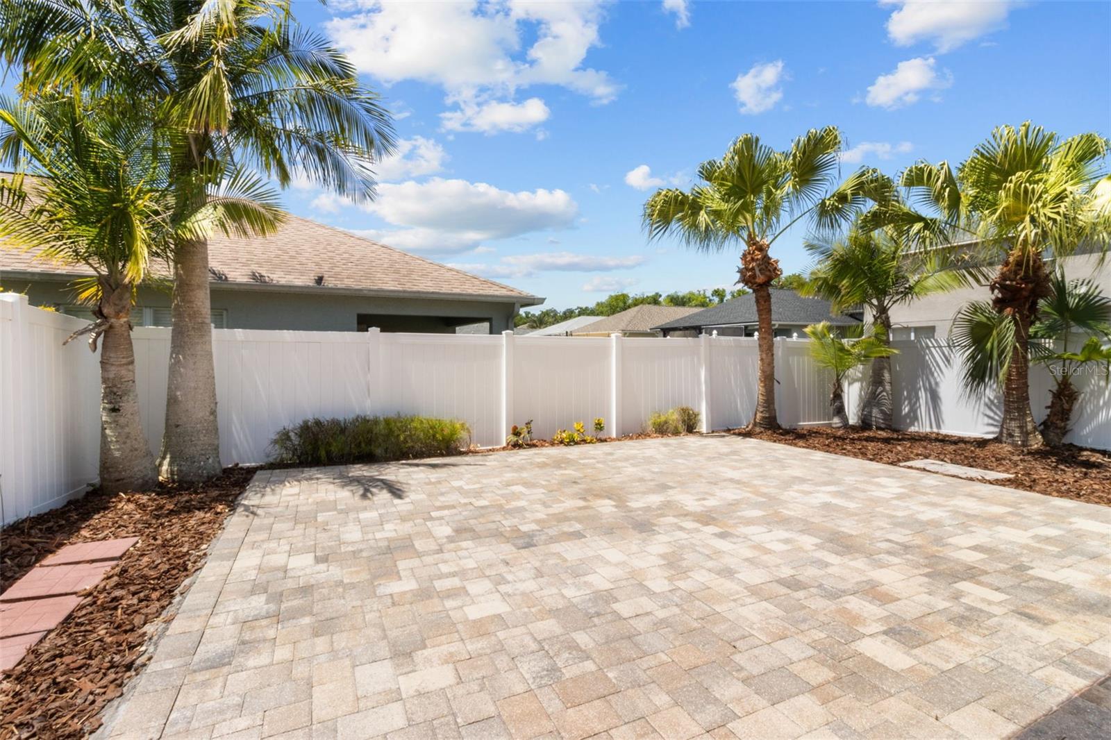 Private fenced in patio with pavers to enjoy barbequing and parties in the backyard!