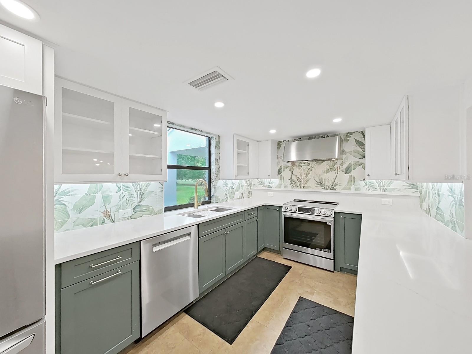 Kitchen updated in 2024 with high-end stainless appliances