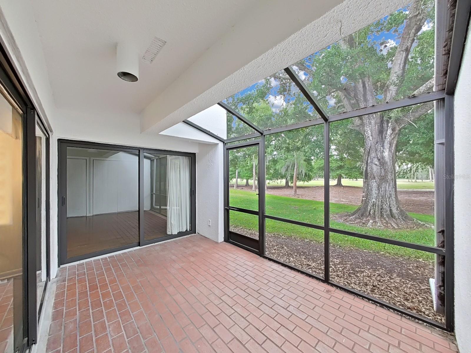 Rear screened Lanai with golf course views
