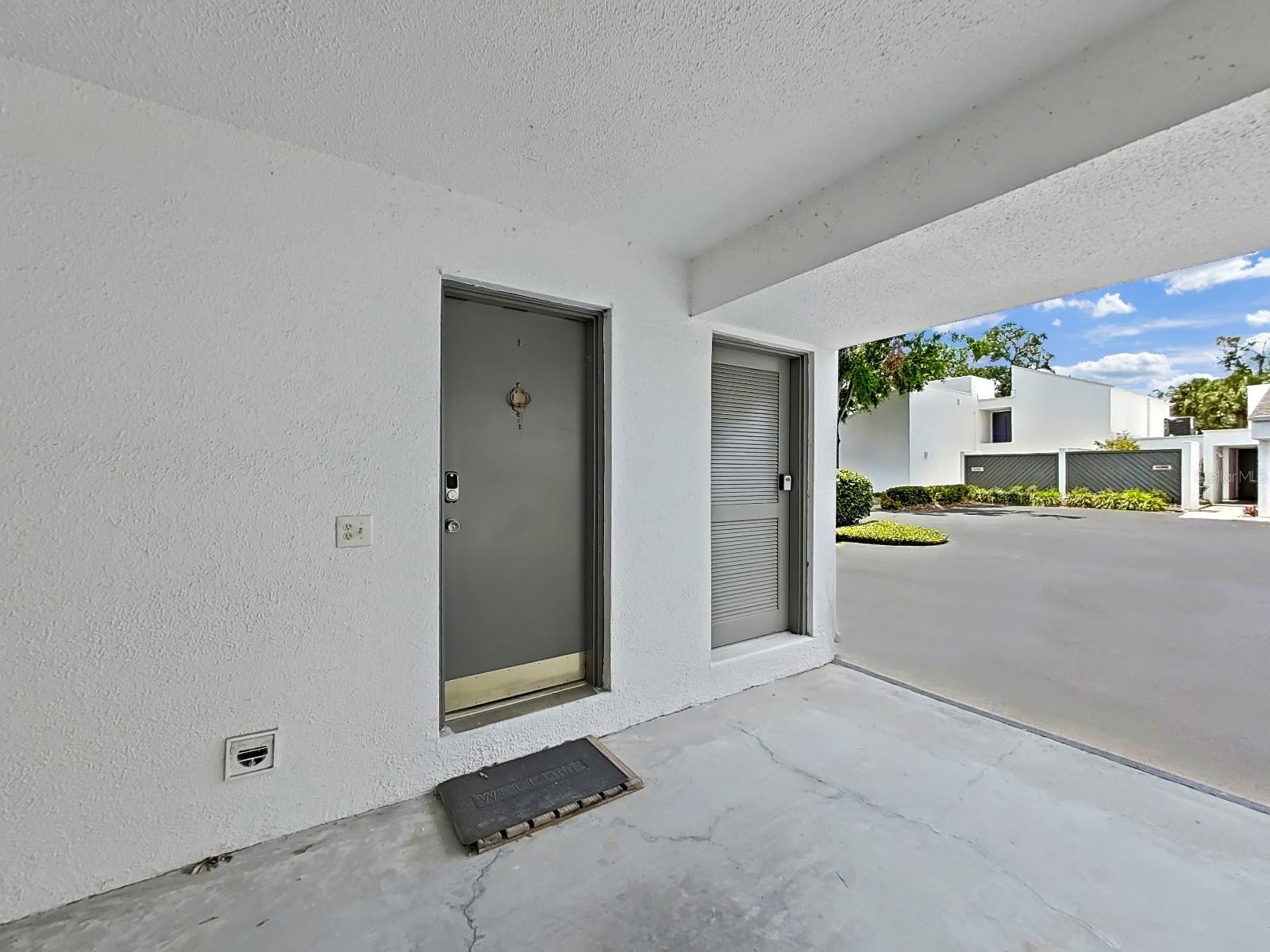 Door from Carport that leads to Laundry Room & inside of home.
