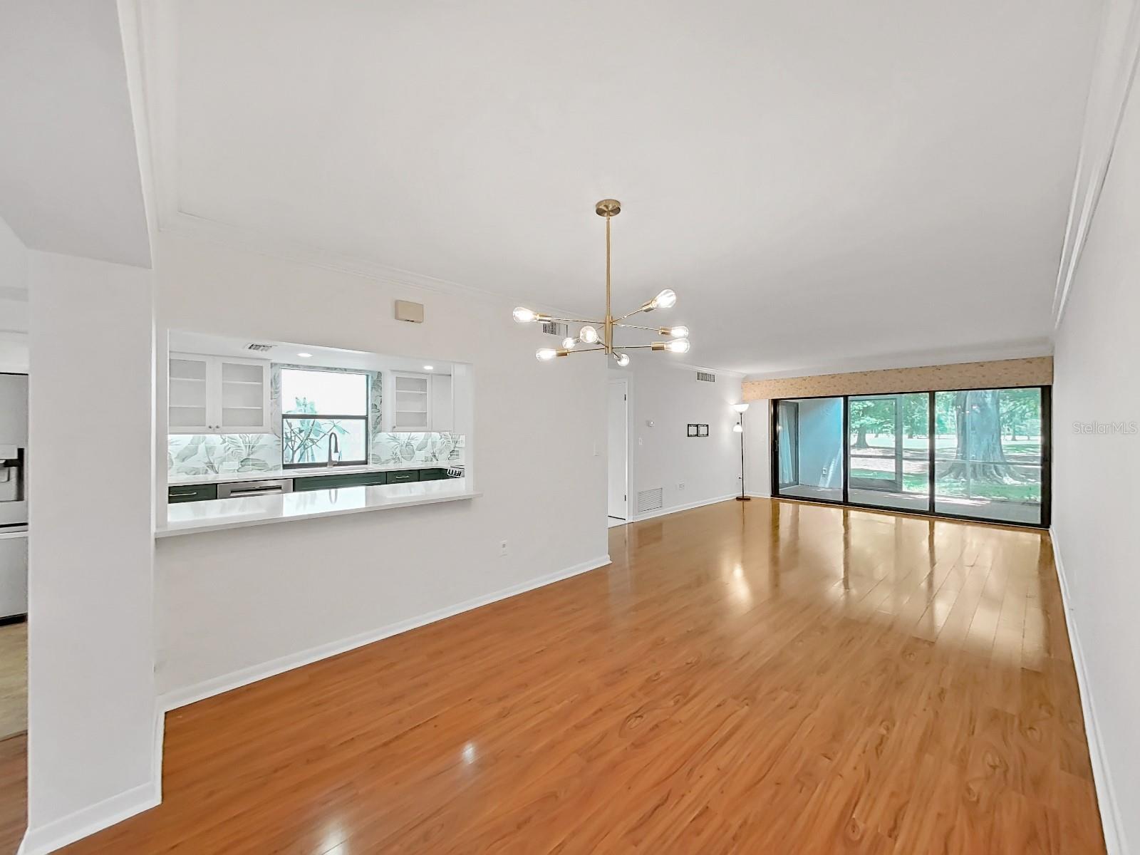 Kitchen bar to Dining Room and Living Room.