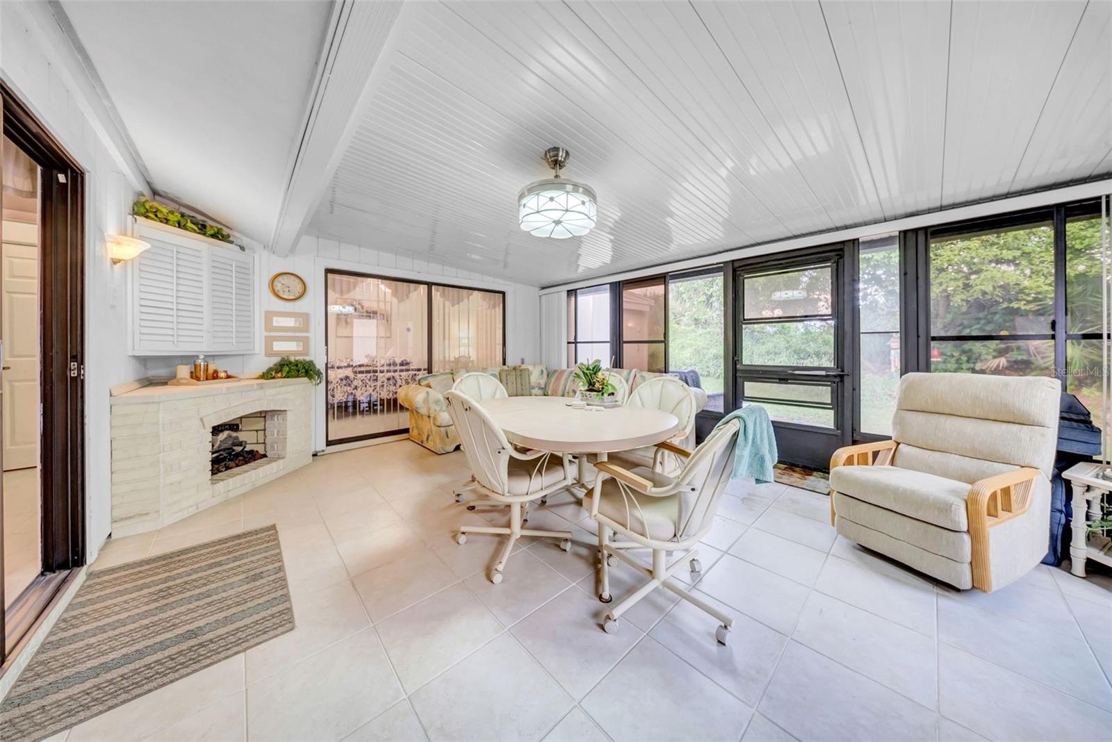 The Florida Room is huge and perfect for entertaining! There's even a Gas fireplace for chilly nights.