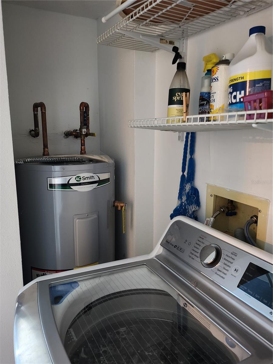 Laundry closet with water heater