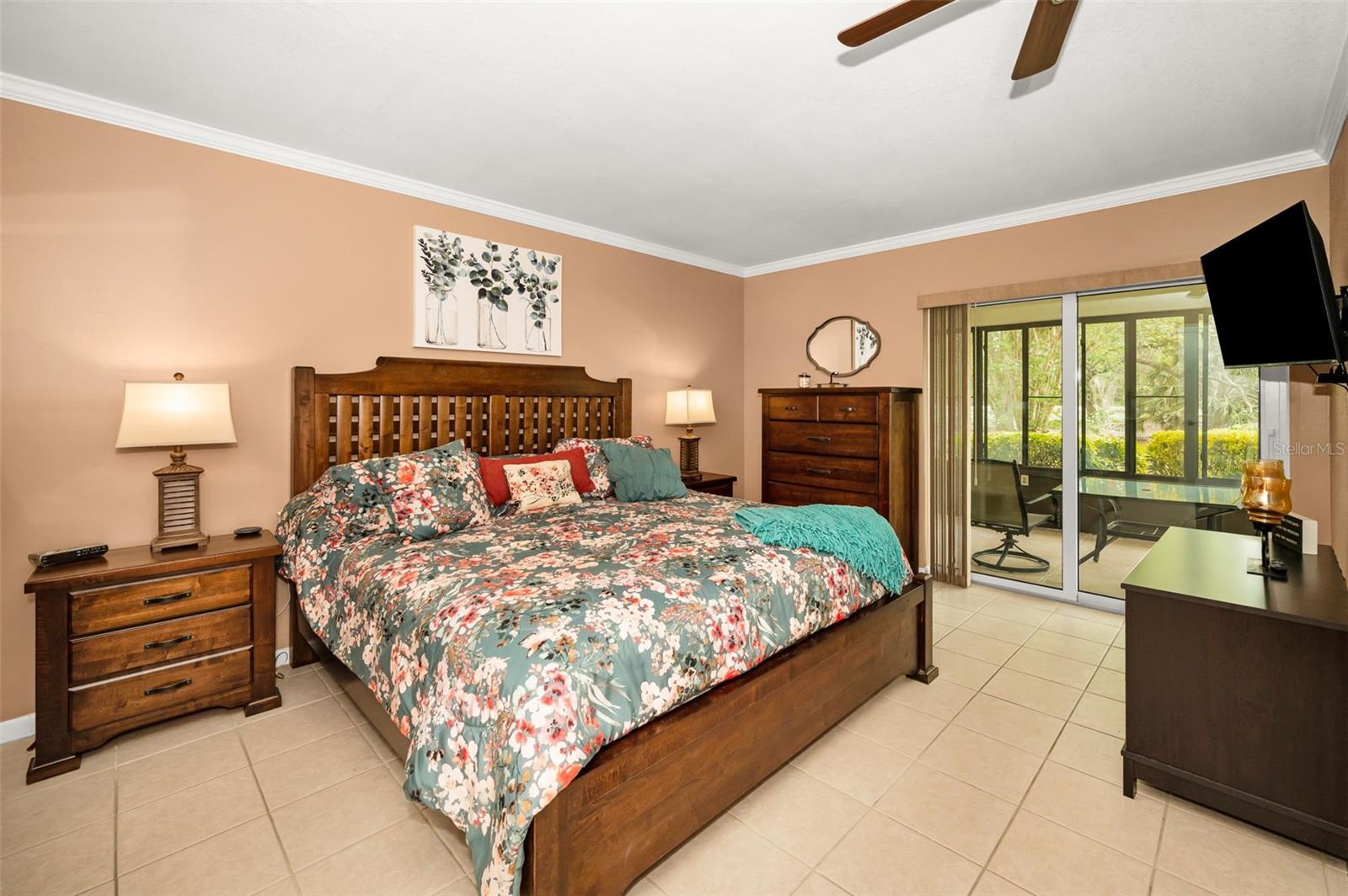 Primary Bedroom with entrance to porch and lanai