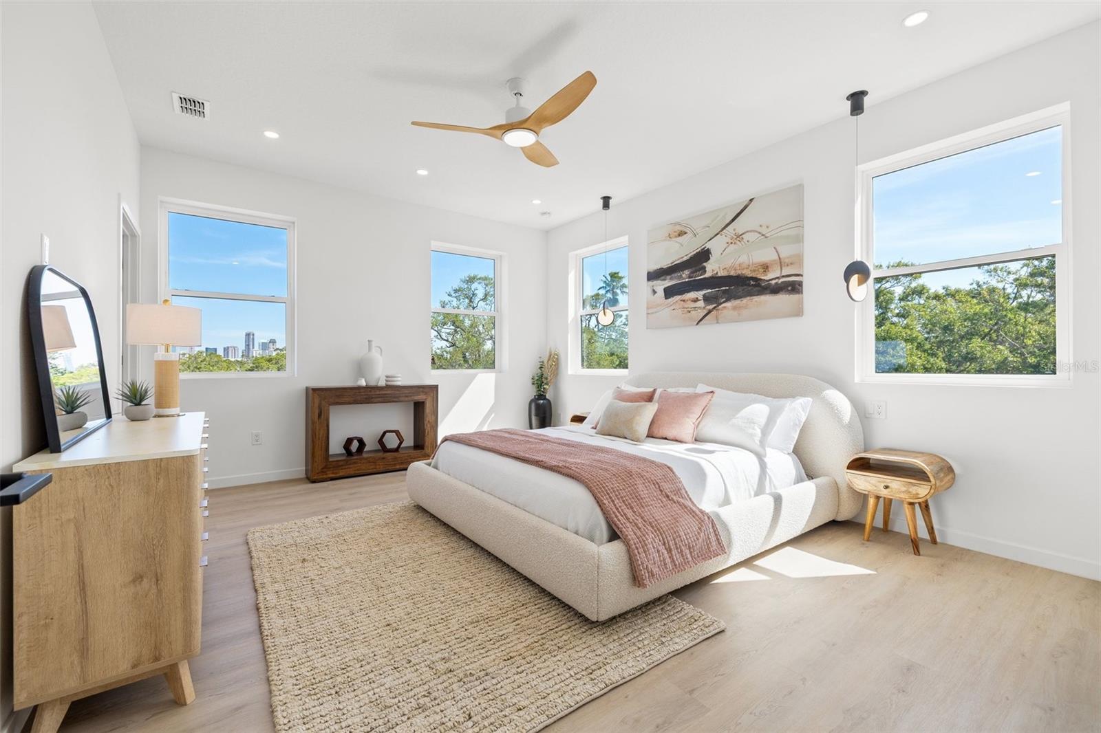 Primary bedroom is extremely large - this is a king bed with plenty of room all around.