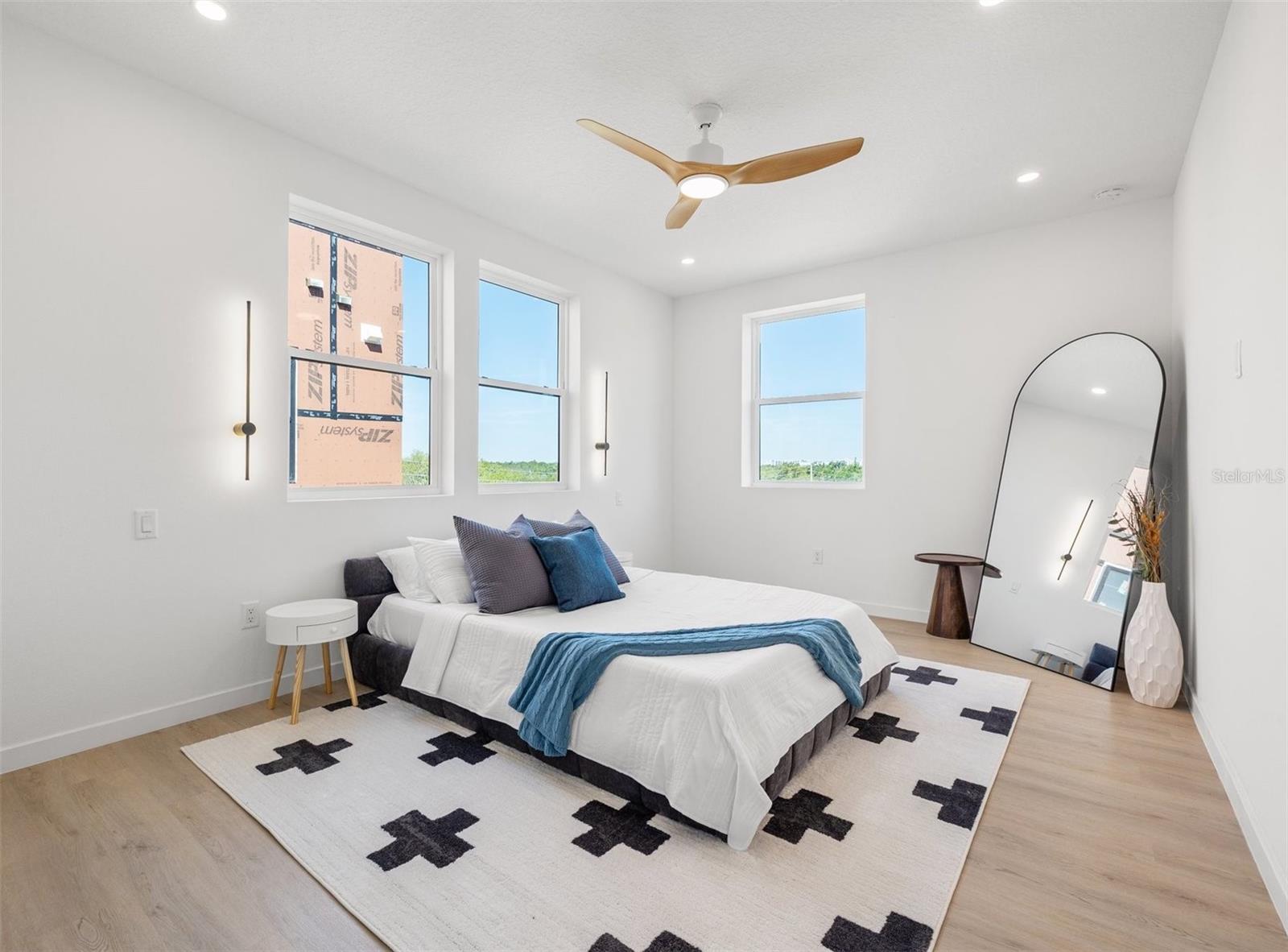 Bedroom 2 with a large walk-in closet and en-suite.
