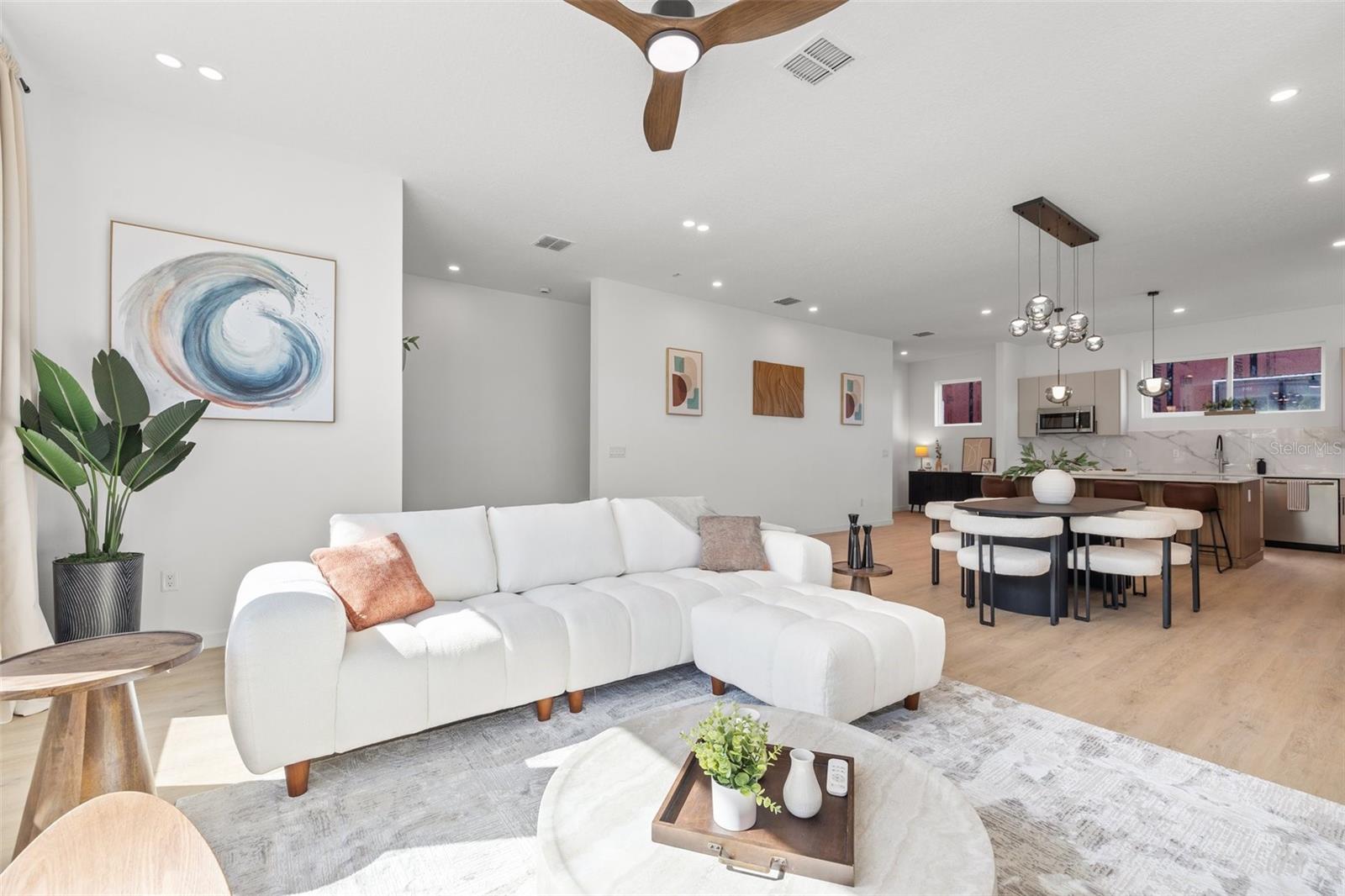 Extra-wide townhome living offering a large living room.