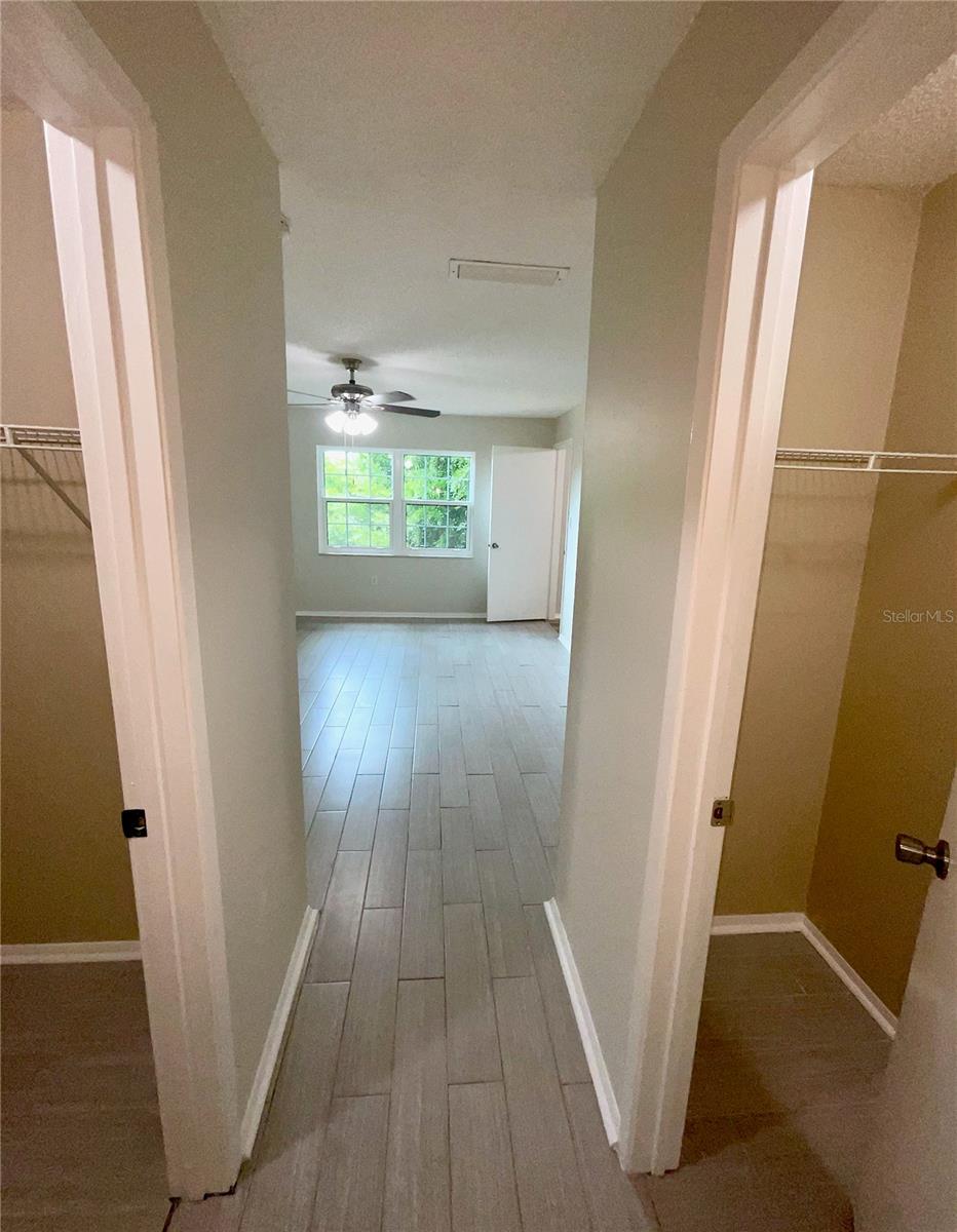 19-Bedroom 2 entry-large walk-in on left and another closet on the right
