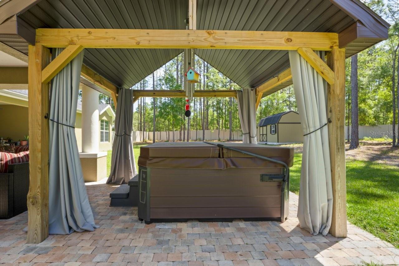 jacuzzi with privacy drapes