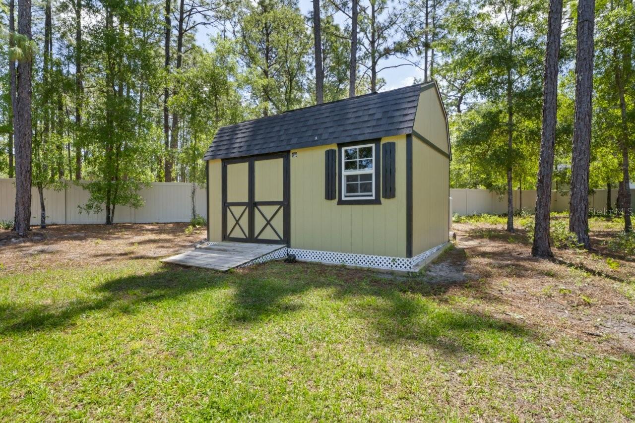custom shed matches the home