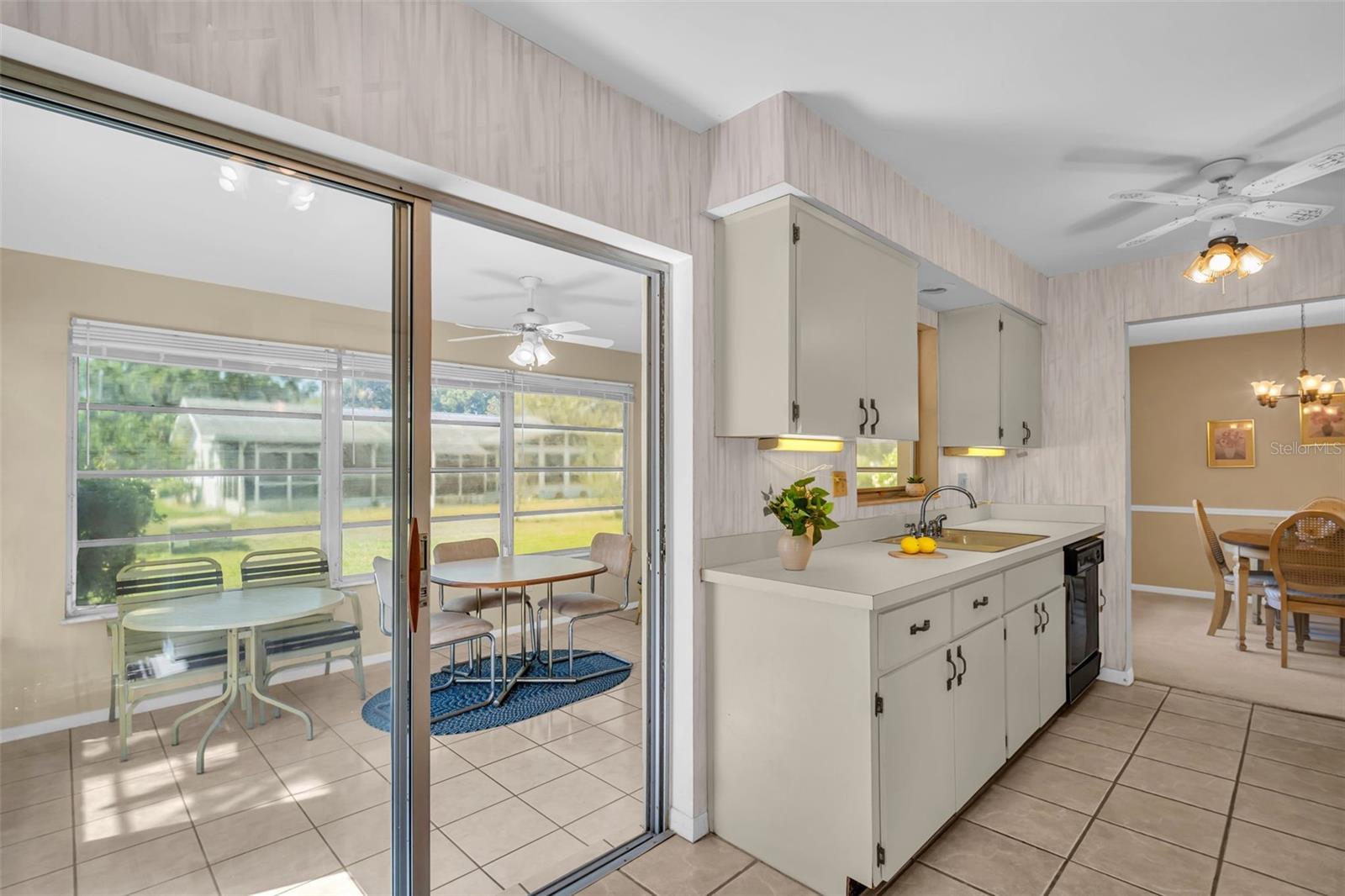 Sliders out to enclosed lanai to enjoy year-round~
