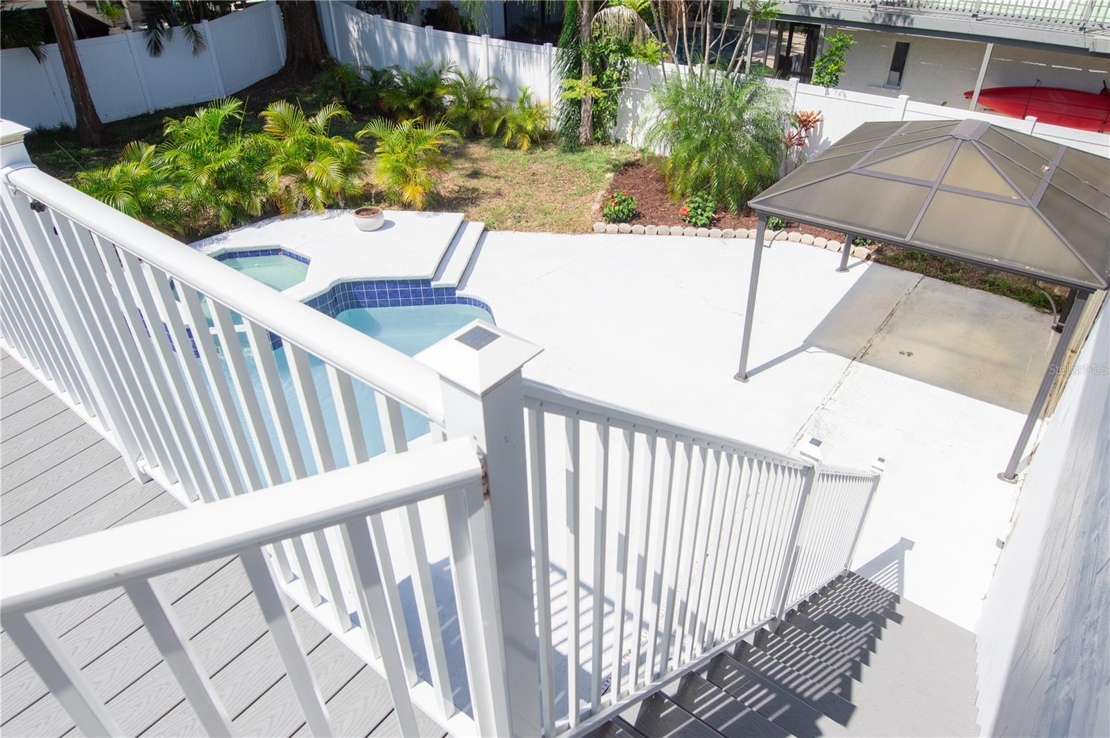STAIRS DOWN TO 12 X 12 GAZEBO AND BACKYARD POOL/SPA