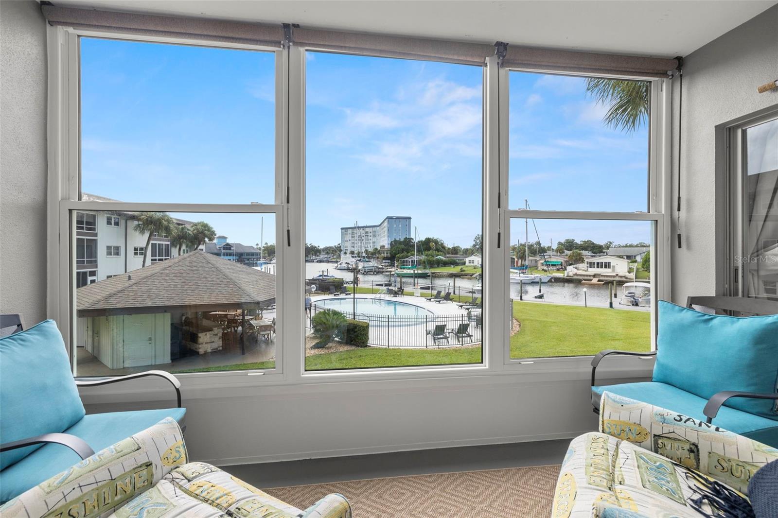 Impact resistant windows!  Enjoy this view year round! The two side windows open to let in the cool ocean breeze!