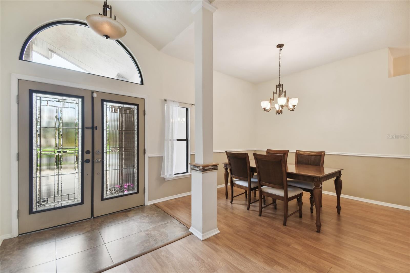 Interior Front door and dining area spacious foyer