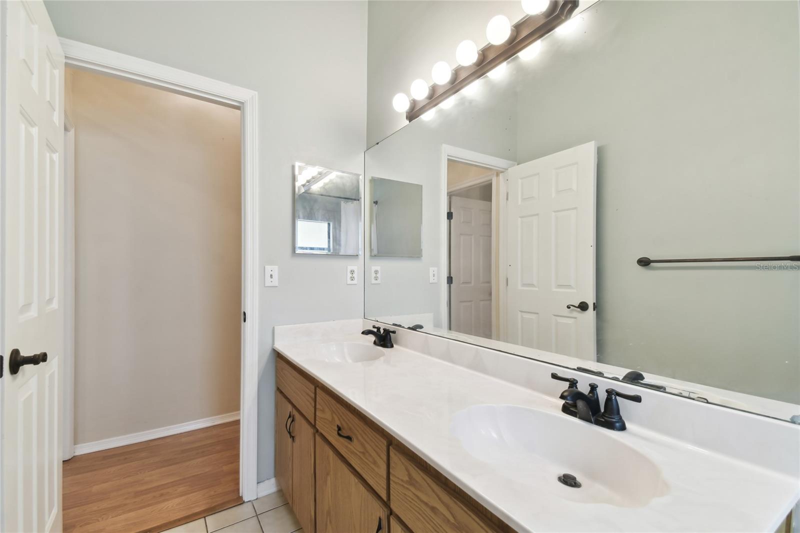 2nd guest bathroom view of hall way