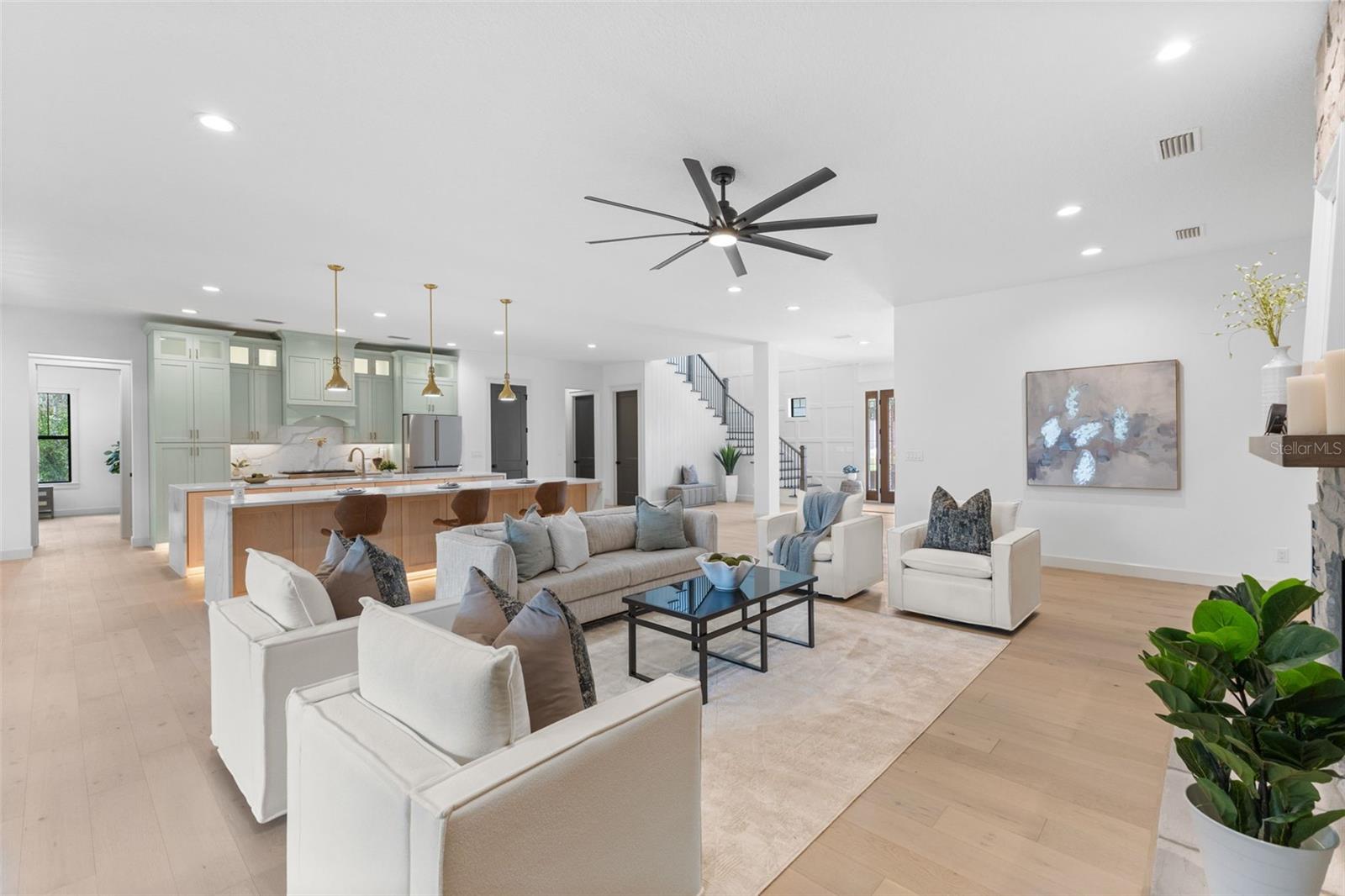 Great Room with wide open floor plan and maple flooring throughout