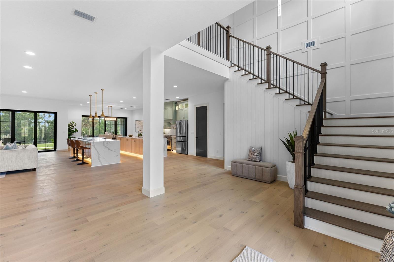 Entryway and stairs to the right ago to the upstairs bonus room