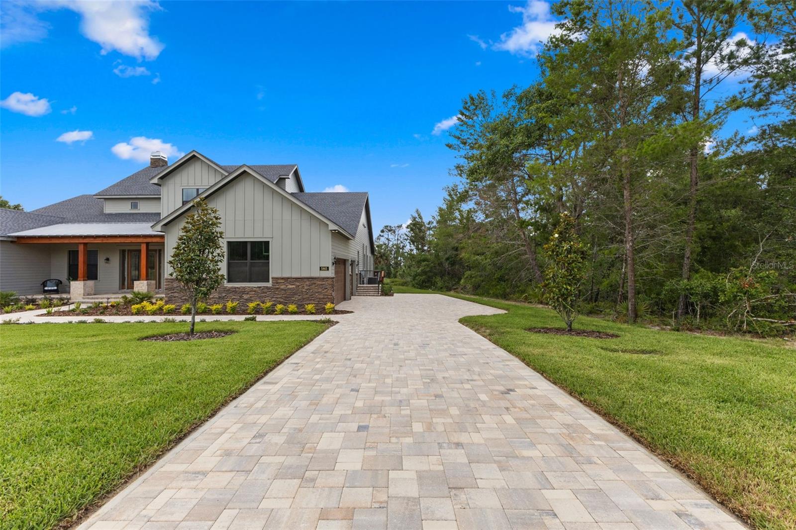 Paver driveway with 3 gar garage