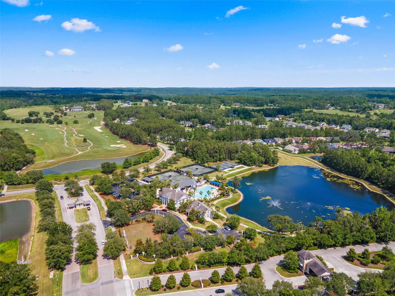 View of the Aquatic Center, Tennis Courts, Pickle Ball  and Lake.