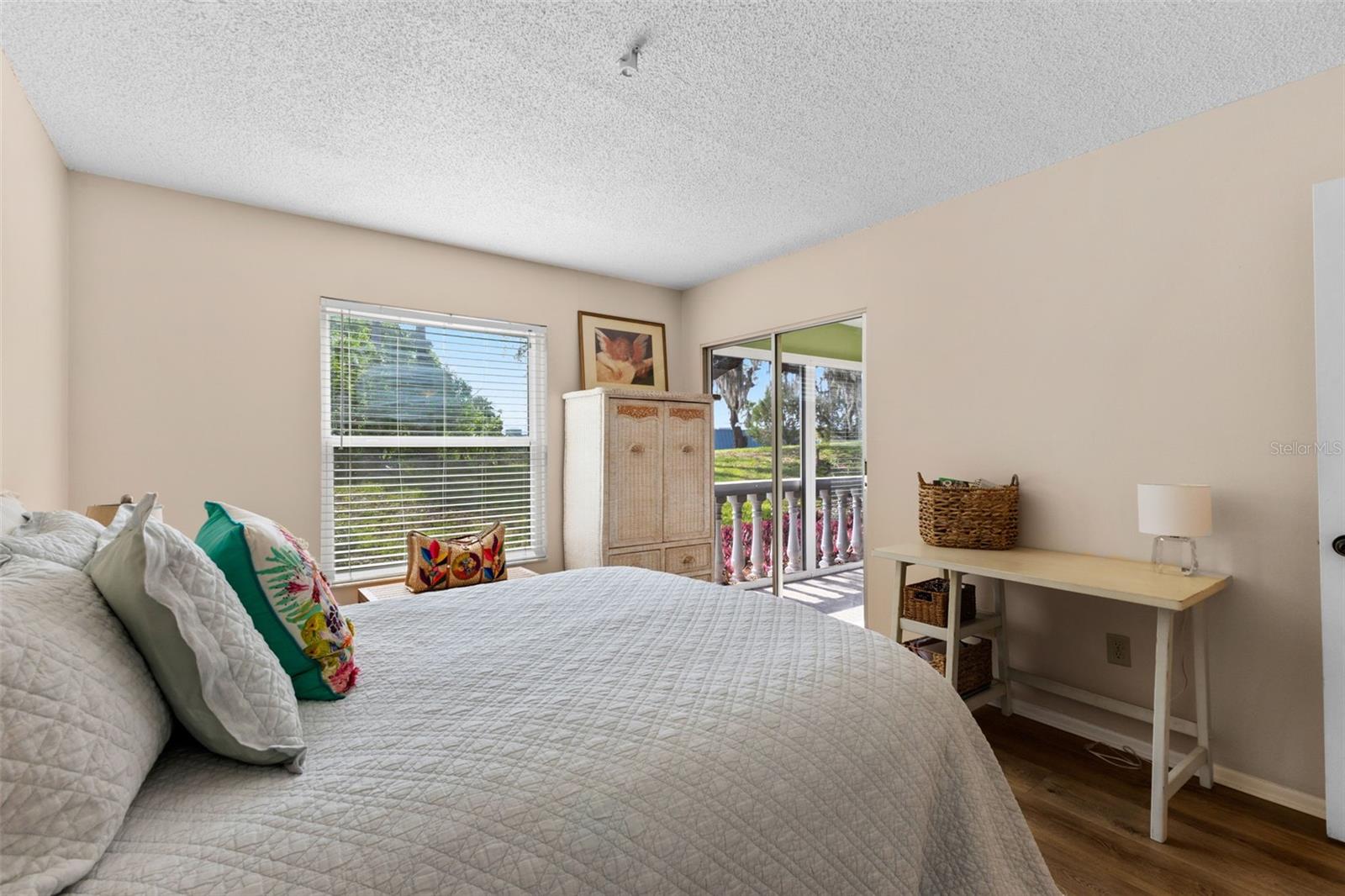Primary Bedroom with a sliding glass door leading to the Lanai