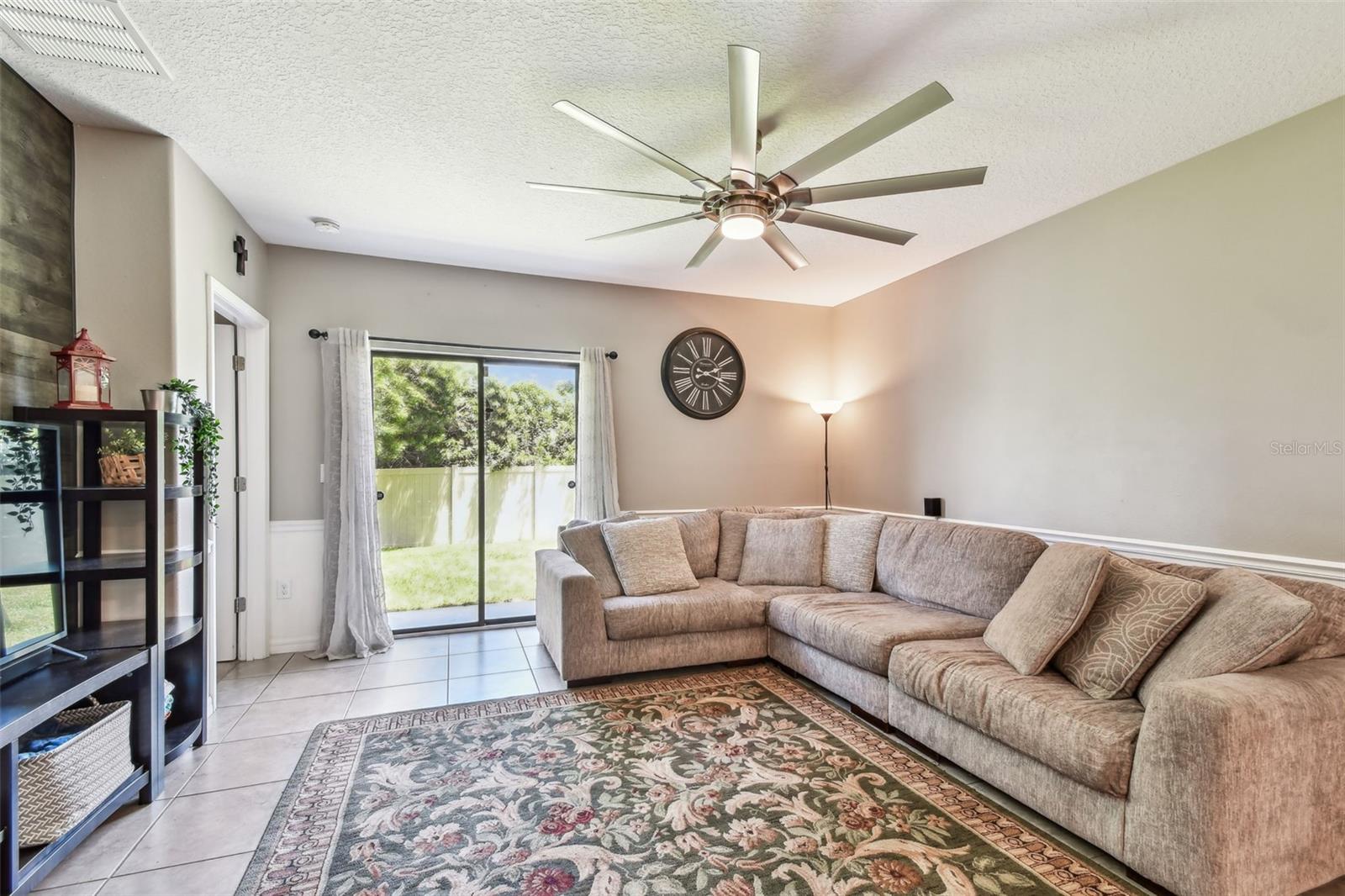 Living room with slider to back yard