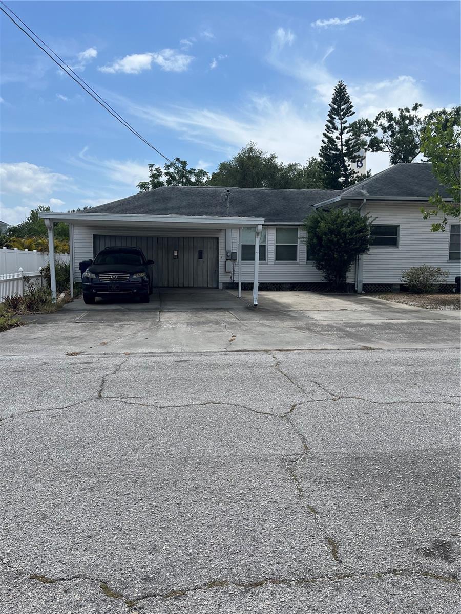2 car garage with carport